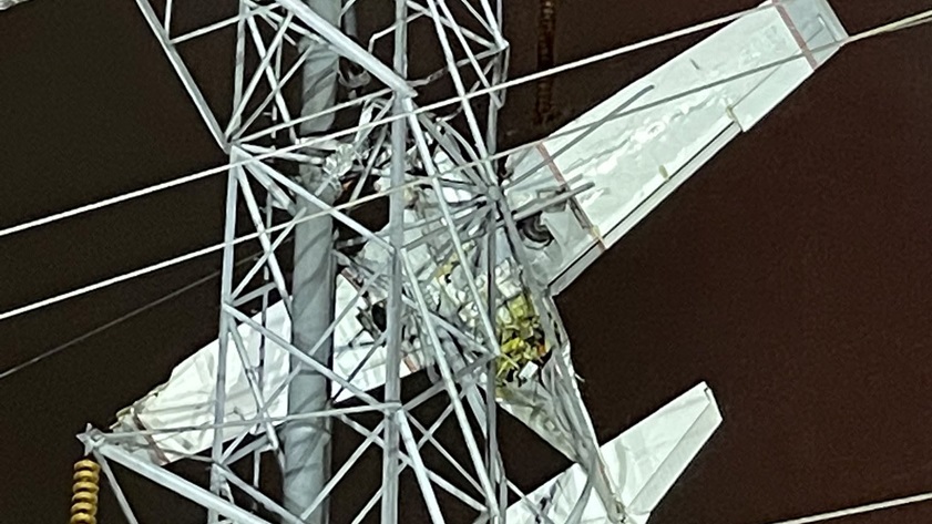 Rescuers said the occupants of the Mooney M20J pictured here were able to call 911 after the aircraft was snared in high-voltage transmission lines November 27 during an instrument approach to Montgomery County Airpark in Gaithersburg, Maryland. Photo courtesy of Montgomery County Fire and Rescue Services.