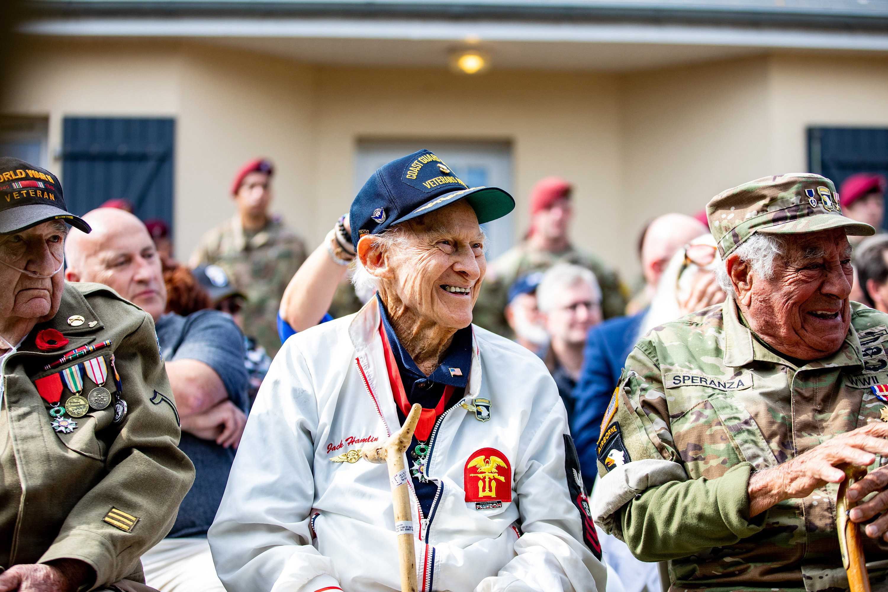 World War II veterans attend a ceremony at the Eternal Heroes Memorial in Normandy, France, June 2, to honor fallen paratroopers who liberated Ravenoville in June 1944. Veterans and representatives of veterans who could not be there received challenge coins during the event. U.S. Army photo by Spc. Vincent Levelev. World War II veterans attend a ceremony at the Eternal Heroes Memorial in Normandy, France, June 2, to honor fallen paratroopers who liberated Ravenoville in June 1944. Veterans and representatives of veterans who could not be there received challenge coins during the event. U.S. Army photo by Spc. Vincent Levelev.