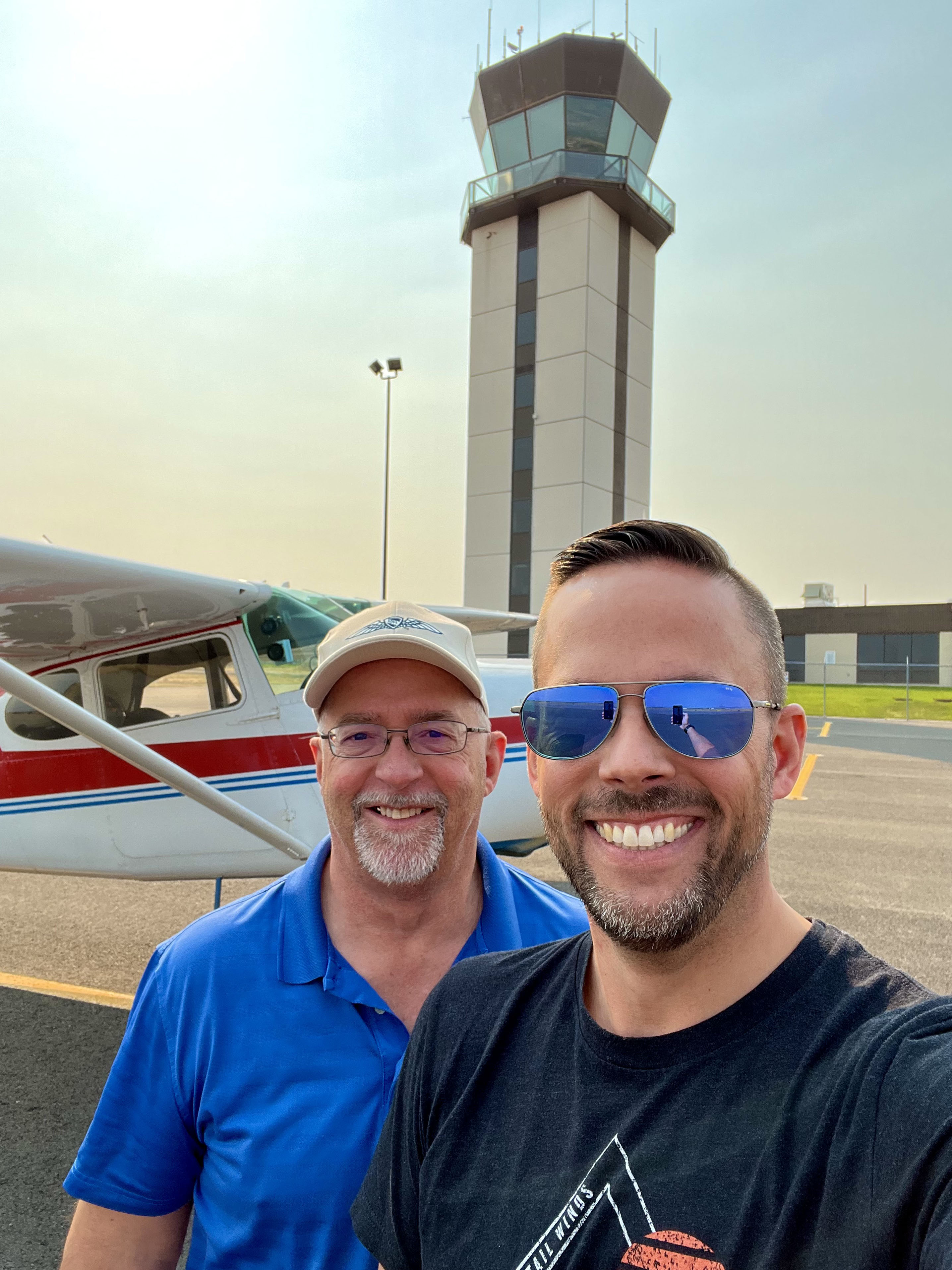Erick and Steve ‘Otto Pilot‘ Webb pose with the AOPA Sweepstakes Cessna 170 and Helena Regional Airport tower. Check out @atcforpilots on Instagram for great air traffic control content from Helena’s ATC. Photo by Erick Webb.