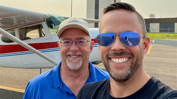 AOPA Social Media Marketer Erick Webb and his dad, Steve ‘Otto Pilot‘ Webb, pose with the AOPA Sweepstakes Cessna 170 in Helena, Montana. Photo by Erick Webb.