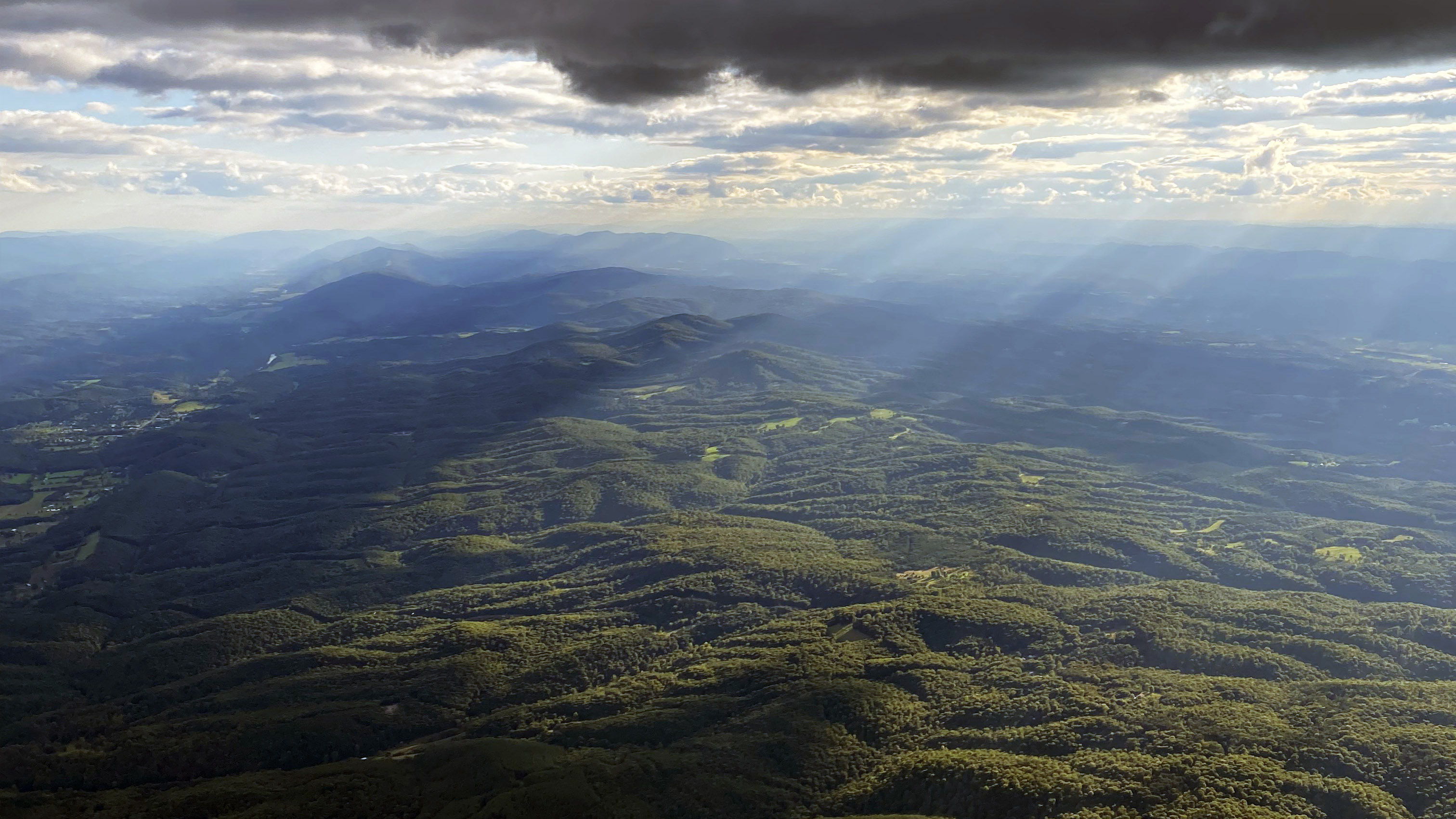 A broken layer over the mountains produced spectacular sunbeams along the route between Ohio and Maryland. Photo by Alyssa J. Cobb.