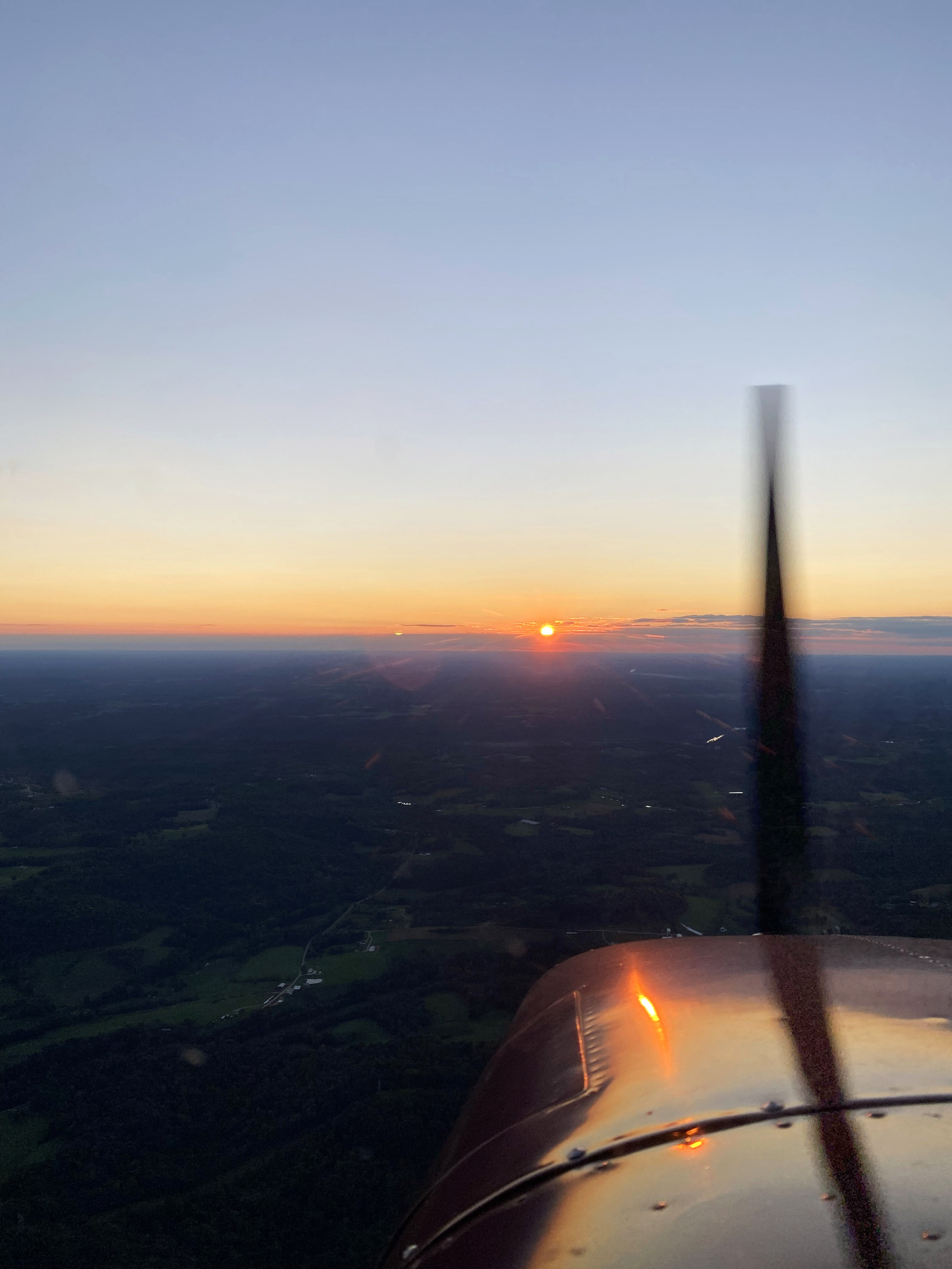 Clear skies and a colorful sunset cap a productive day that made it possible for the author to fly round trip between Ohio and Maryland to attend meetings at AOPA headquarters and make it home in time for her son’s bedtime routine. Photo by Alyssa J. Cobb.