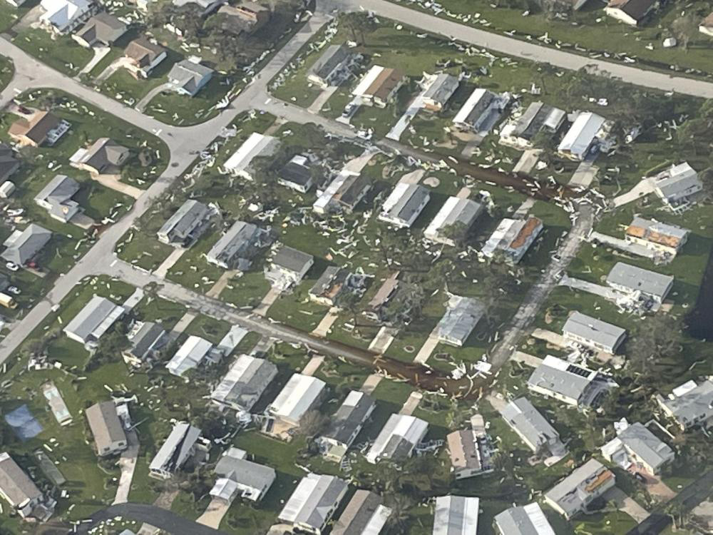 A U.S. Coast Guard aircrew from Air Station Miami, Florida, flew over Fort Myers, Florida, and the surrounding area on September 29 looking for people in distress, damage, and potential pollution. U.S. Coast Guard photo by Petty Officer 3rd Class Kruz Sanders.