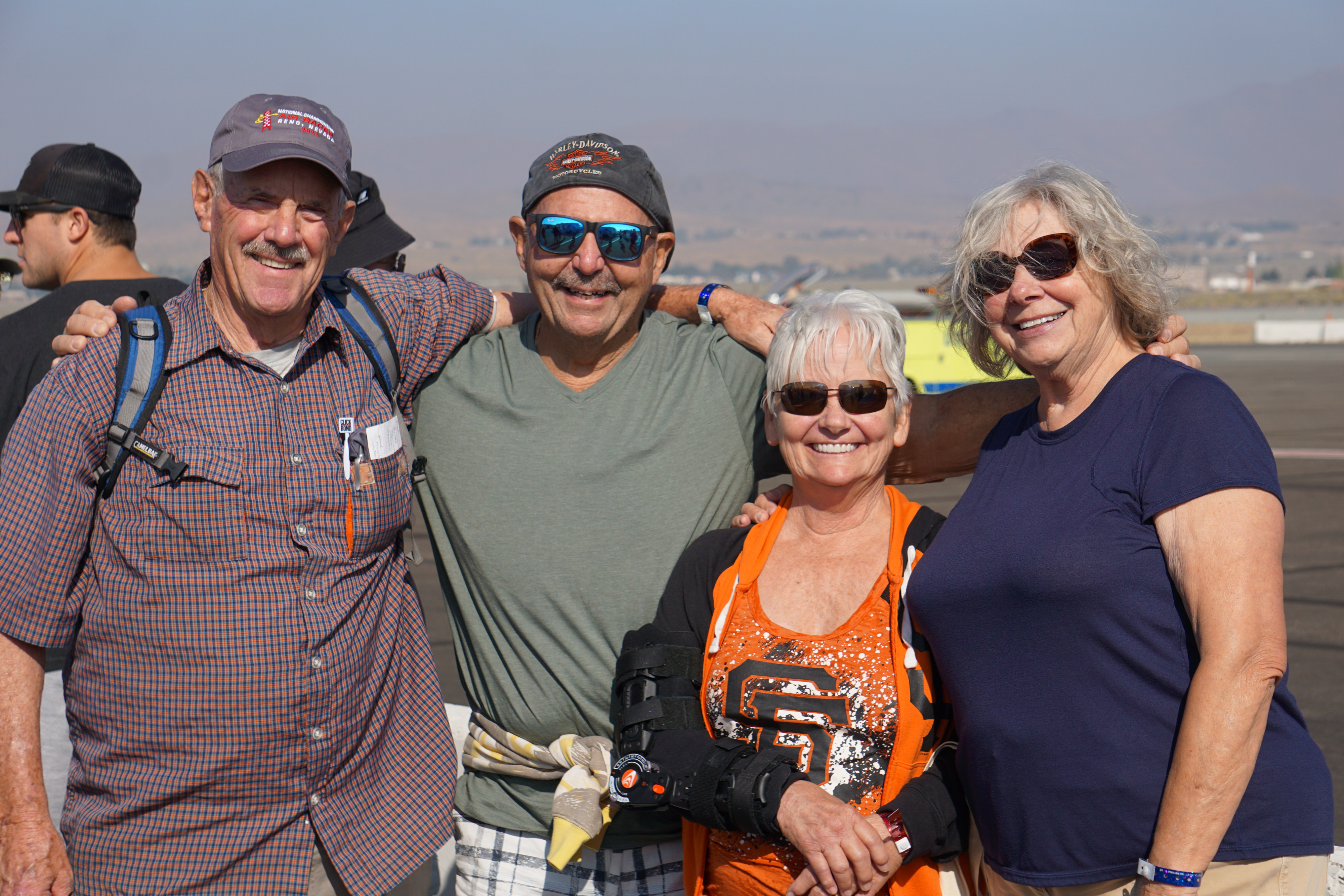 Reno locals, from left to right, Jeff Kreck, Tim Piazza, Lisa Piazza, and Peggy Kreck, showed their support for the biplane class. Photo by Cayla McLeod Hunt.