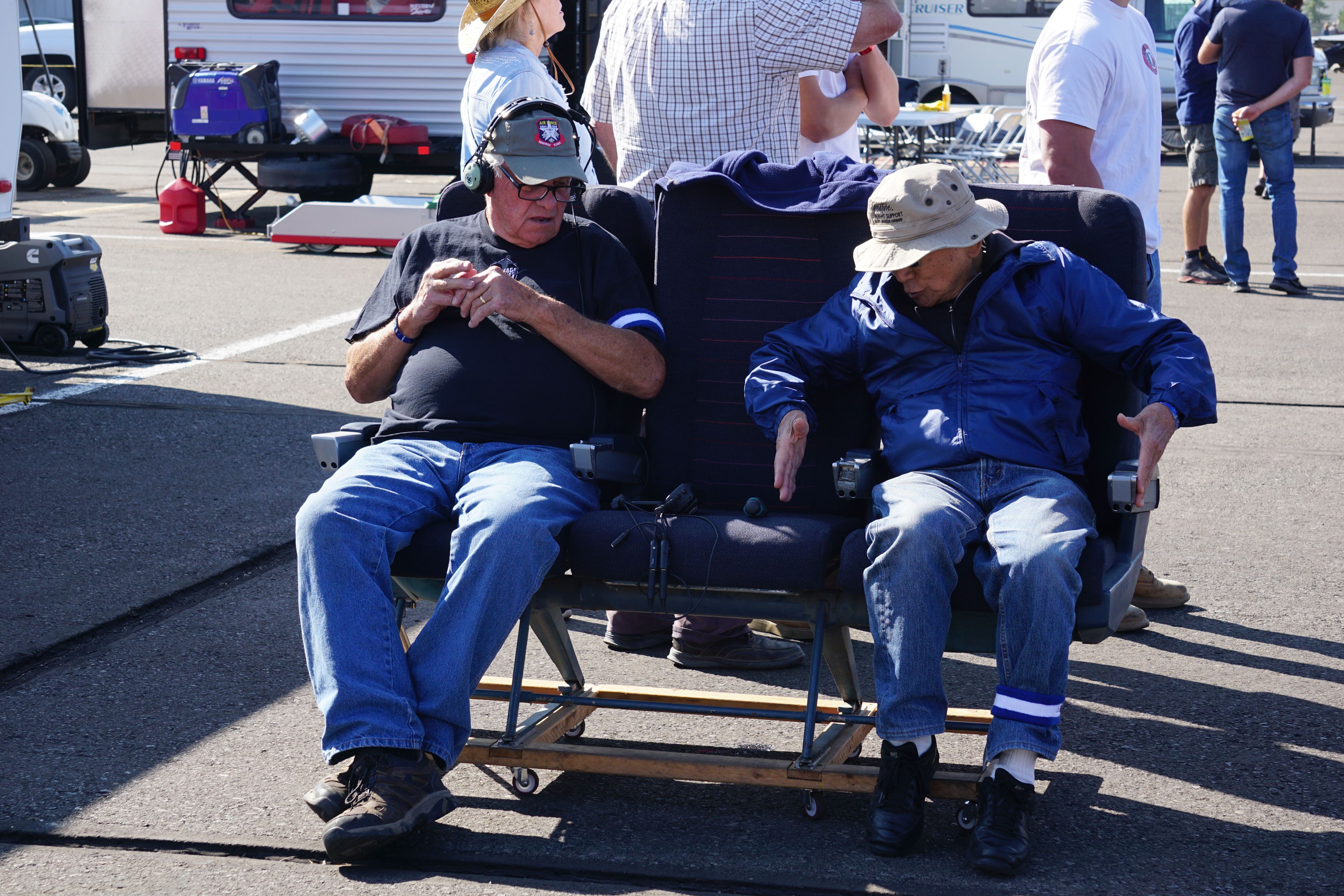 Two gentlemen enjoy glamourous airline seating for ideal race viewing. Photo by Cayla McLeod Hunt.