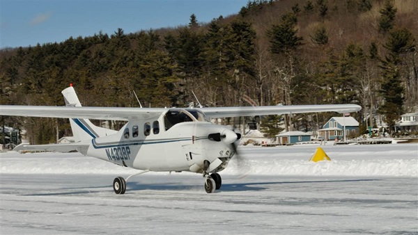 Volunteers who maintain the seasonal ice runway in Alton Bay on Lake Winnipesaukee in New Hampshire called off operations for 2023 due to lack of ice. Photo by Mike Collins.