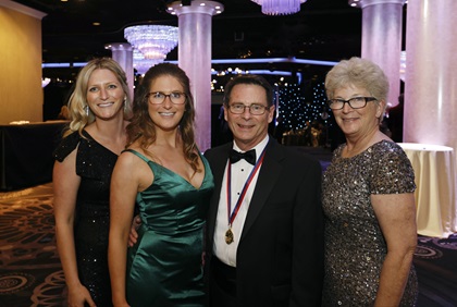 Tom Haines celebrated his Living Legends induction with his family: From left, daughters Jenna and Lauren, and his wife, Brenda. Photo by Chris Rose.