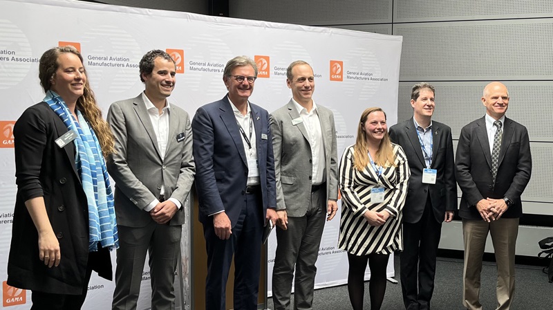 From left, Cate Brancart, General Aviation Manufacturers Association manager of European operations and safety; Elixir Aircraft co-founder Cyril Champenois; Daher Senior Vice President of Aircraft Nicolas Chabbert; Textron eAviation CEO Rob Scholl; ZeroAvia consultant Jane Lefley; Urs Thomann, director of technologies and process at Pilatus; and SimCom International CEO Eric Hinson. Photo by Sylvia Horne.