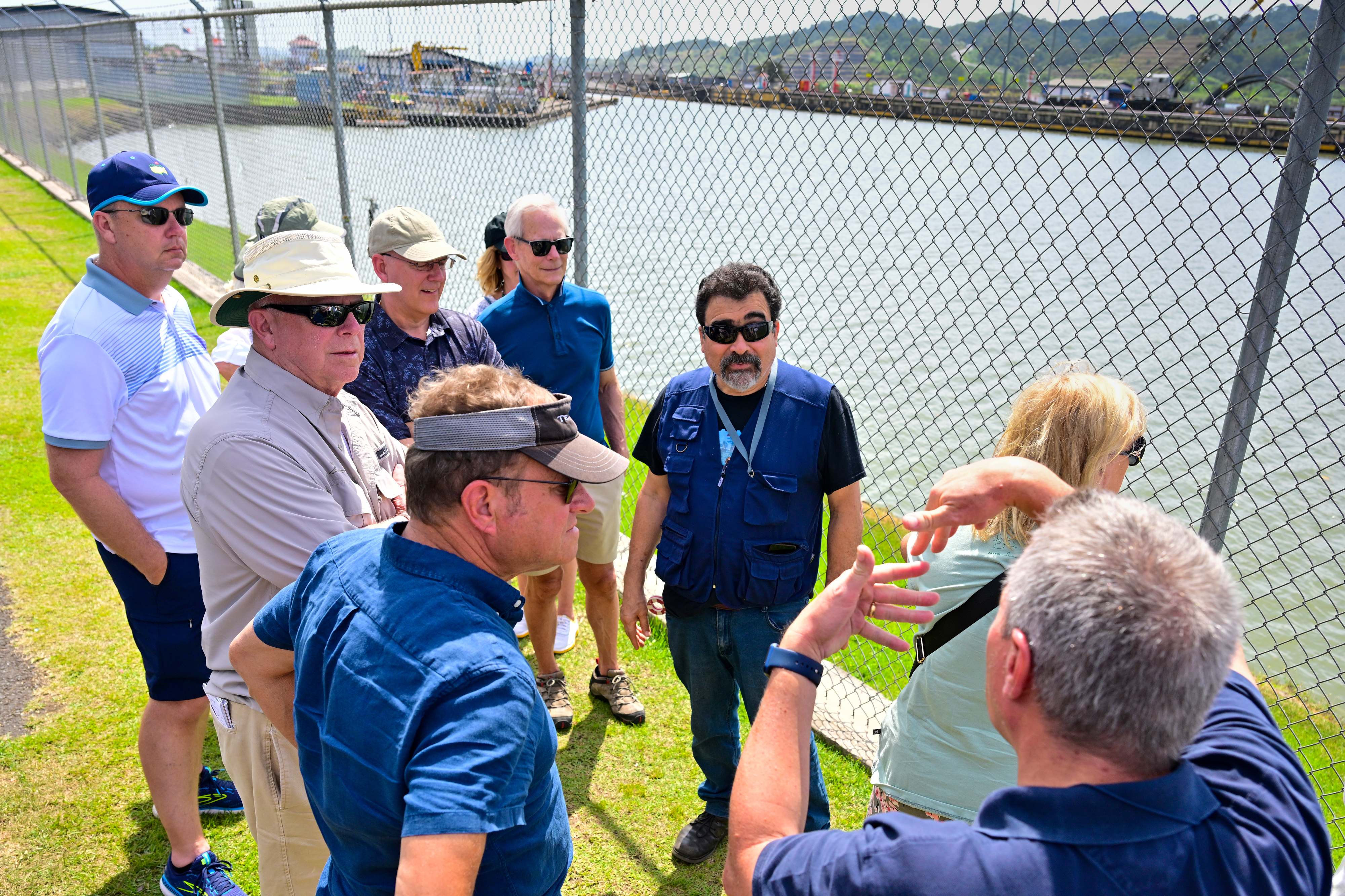 The tour group learns about the dynamics of locks able to raise and lower huge vessels passing through the Panama Canal. Photo by David Tulis.