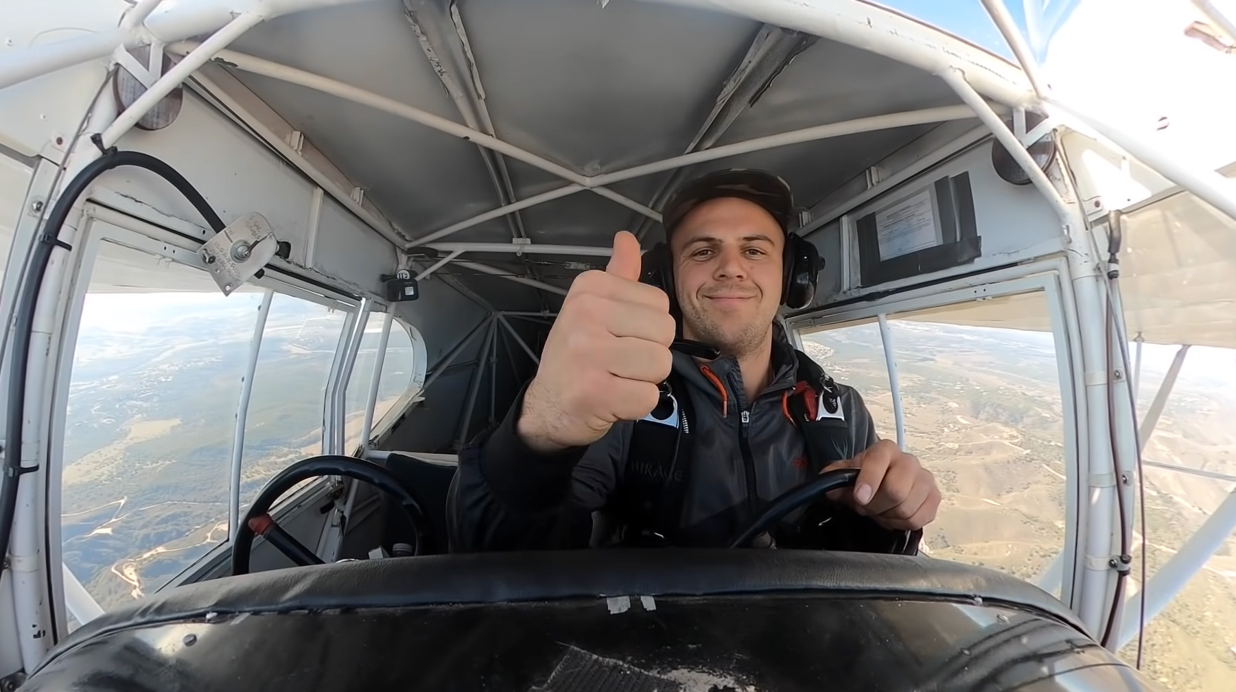 Trevor Jacob gestures to the camera in this screenshot from his "I Crashed My Airplane" YouTube video, a copy of which was among documents filed by the U.S. Department of Justice in support of criminal charges against the former pilot whose certificate was revoked by the FAA in April 2022.