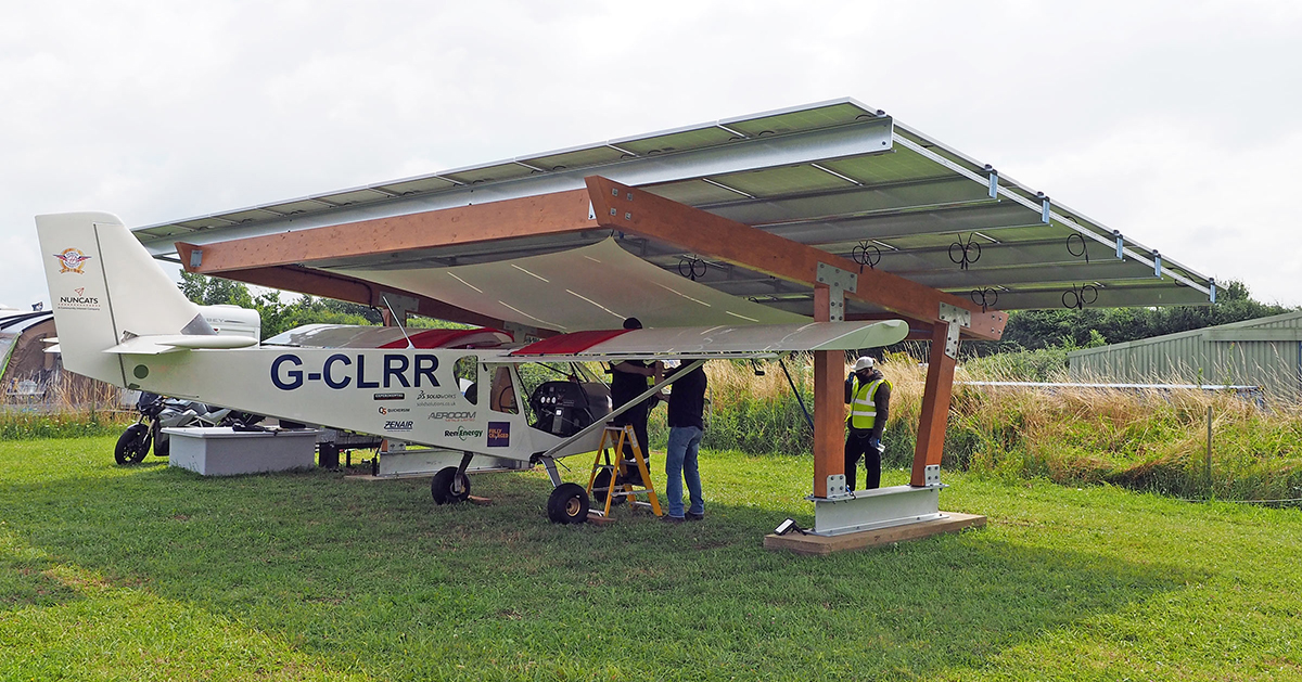 The “Sky Jeep” charges below its solar charging station at Old Buckenham Airfield in south Norfolk, United Kingdom. Photo courtesy of NUNCATS.