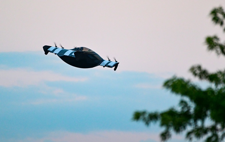 The Opener Black Fly eVTOL performs during the night airshow at EAA AirVenture Oshkosh in 2022. The company announced a special program for early adopters at this year's event. Photo by David Tulis.