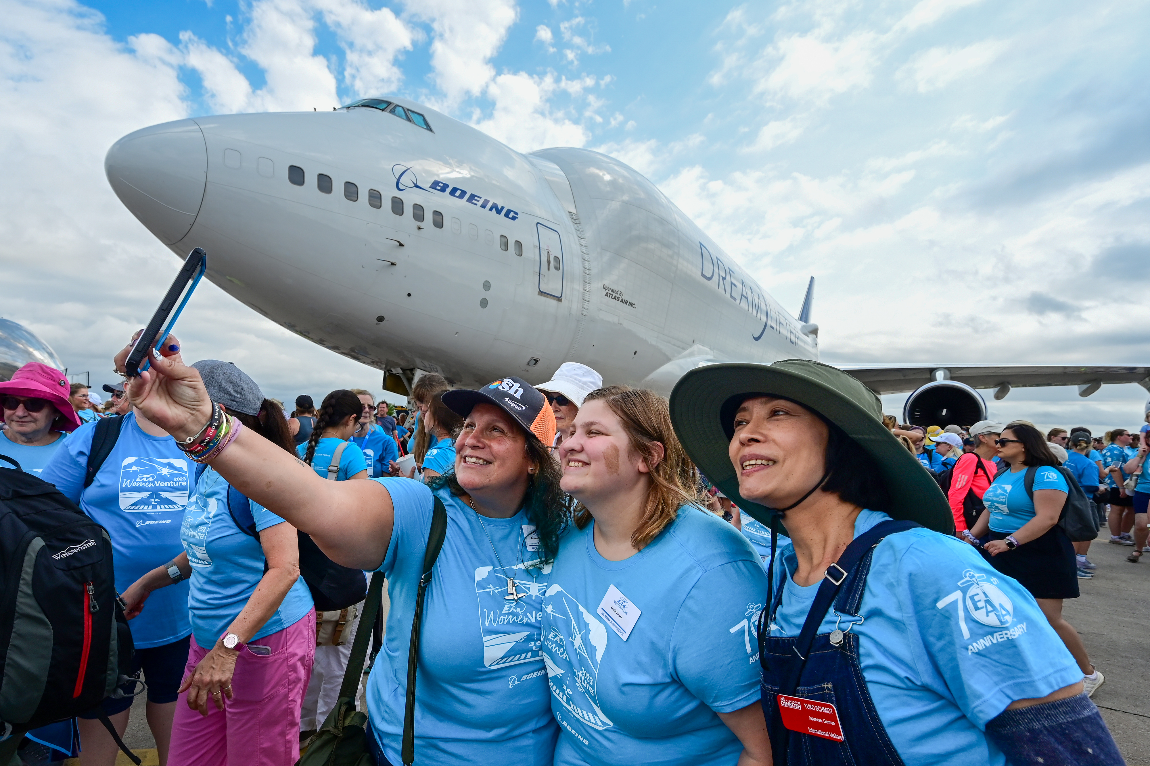 WomenVenture participants capture a memory near a Boeing Dreamlifter and NASA's Super Guppy. Photo by David Tulis.