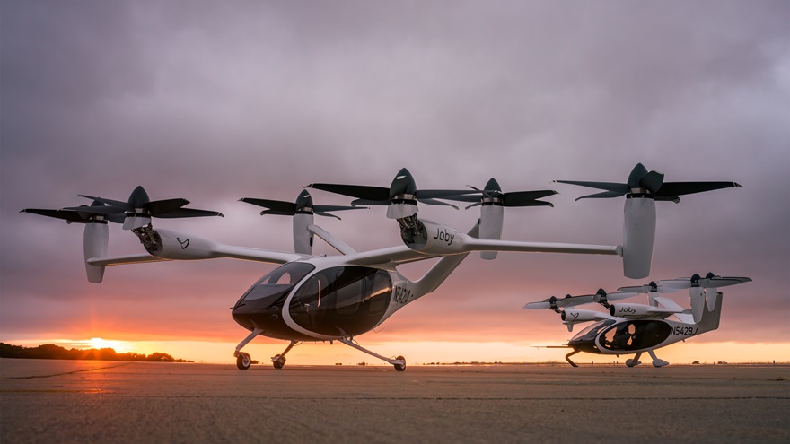 Joby Aviation unveiled the production prototype of its new eVTOL in California, with the previous S4-1 prototype in the background. Photo courtesy of Joby Aviation.