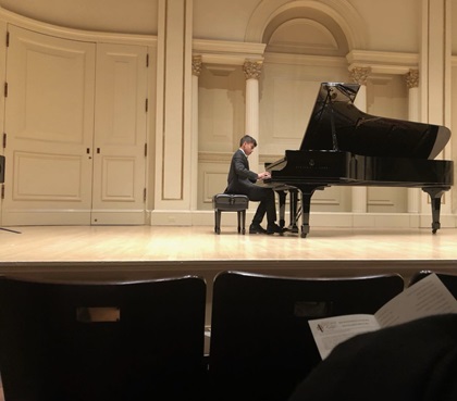 Justin Duval plays the piano at Carnegie Hall. Photo courtesy of Justin Duval.