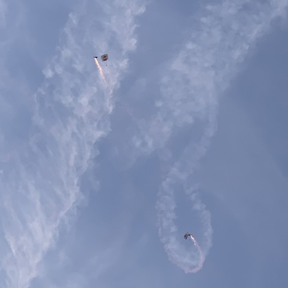 Aerial entertainment also included a pair of Red Bull skydivers dropping in. Photo by Alicia Herron.