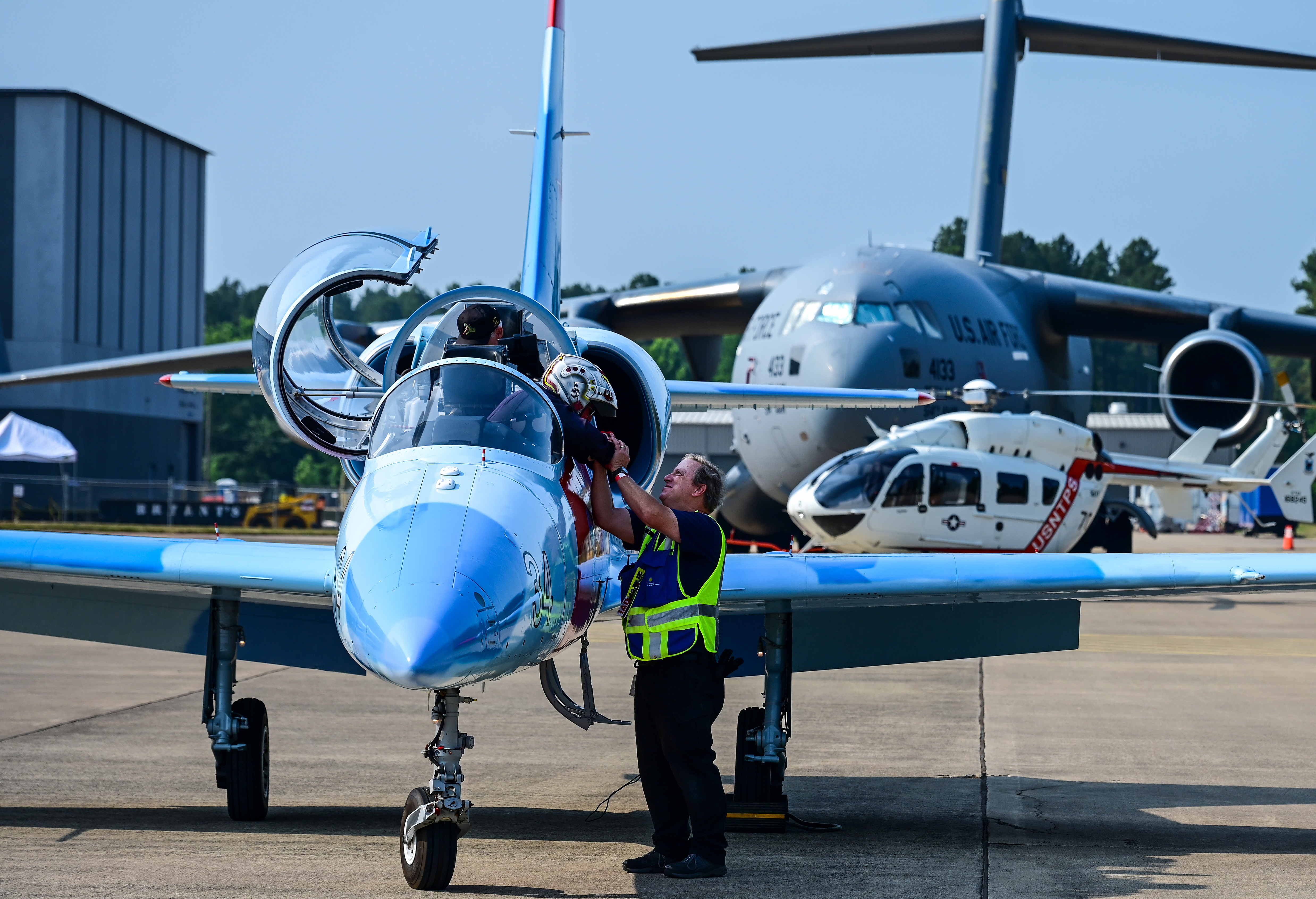 Families with children turned out in droves to see, touch, and sit in more than 55 aircraft during Innovation in Flight Day at the Smithsonian National Air and Space Museum's Steven F. Udvar-Hazy Center adjacent to Washington Dulles International Airport on June 17. Photo by David Tulis.
