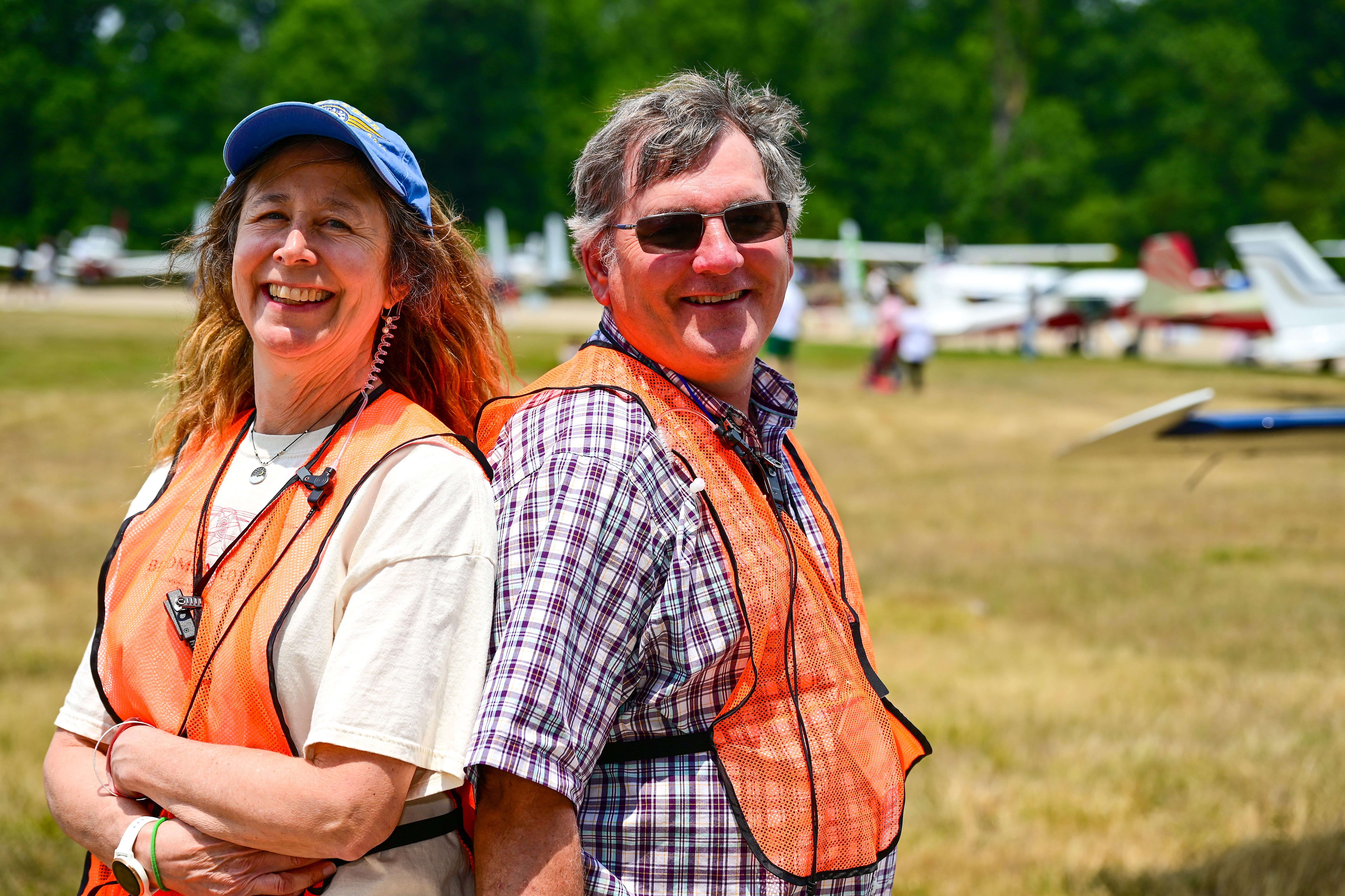 Husband and wife aviators and flight line volunteers Kathy McGurran and Dan Metz traveled from Denver to assist pilots parking to take part in the Smithsonian National Air and Space Museum's Innovation in Flight Day. Photo by David Tulis. 
