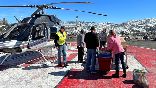 More than 500 volunteers collected 21,000 pounds of food and other essential supplies that were flown to people cut off by powerful snowstorms. Photo courtesy of CalDART.