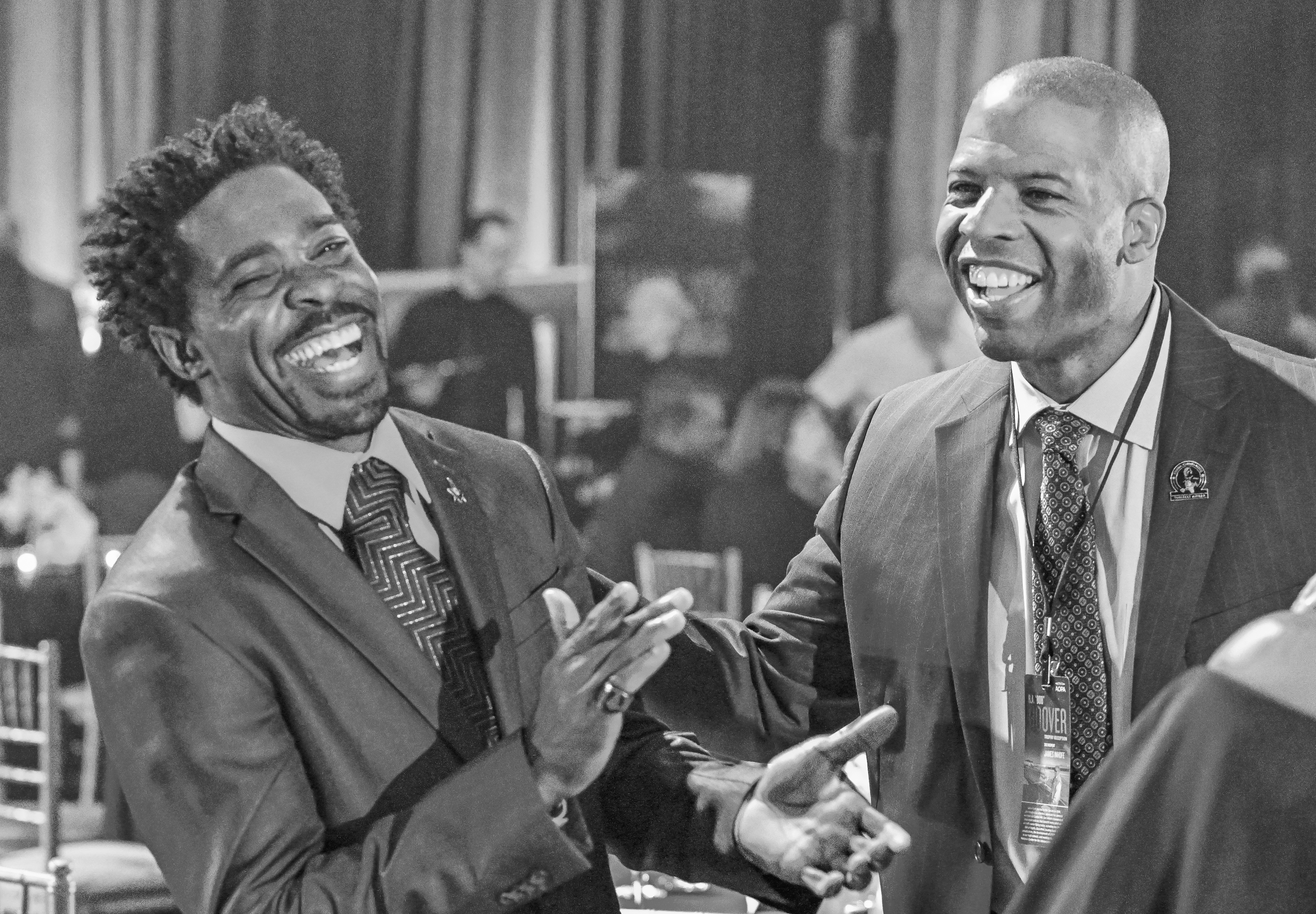 Brigadier General Charles E. McGee Aviation Inspiration Award winner Ramone Hemphill shares a laugh with previous McGee Award winner Kenyatta Ruffin. Photo by David Tulis.