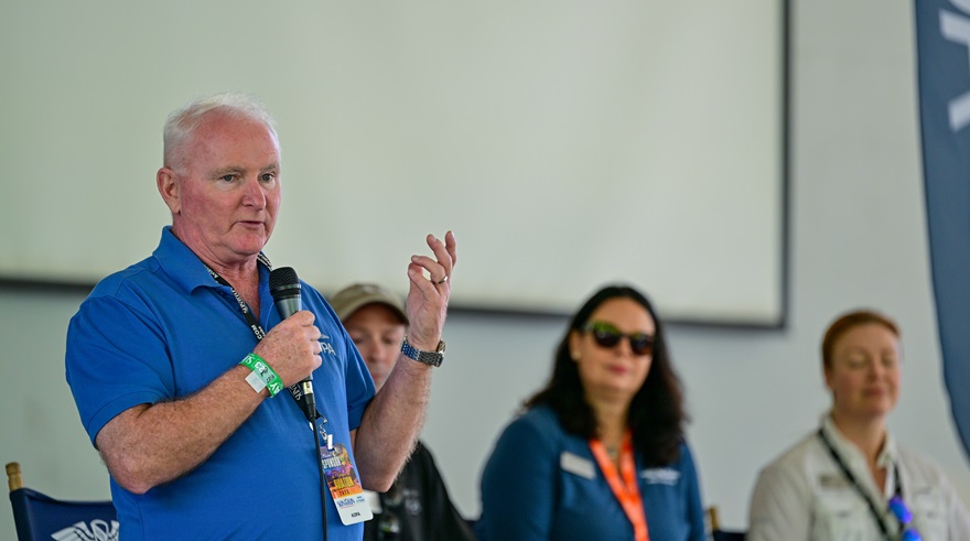 AOPA President Mark Baker speaks to attendees at a Pilot Town Hall during the Sun 'n Fun Aerospace Expo on March 29. Photo by David Tulis.