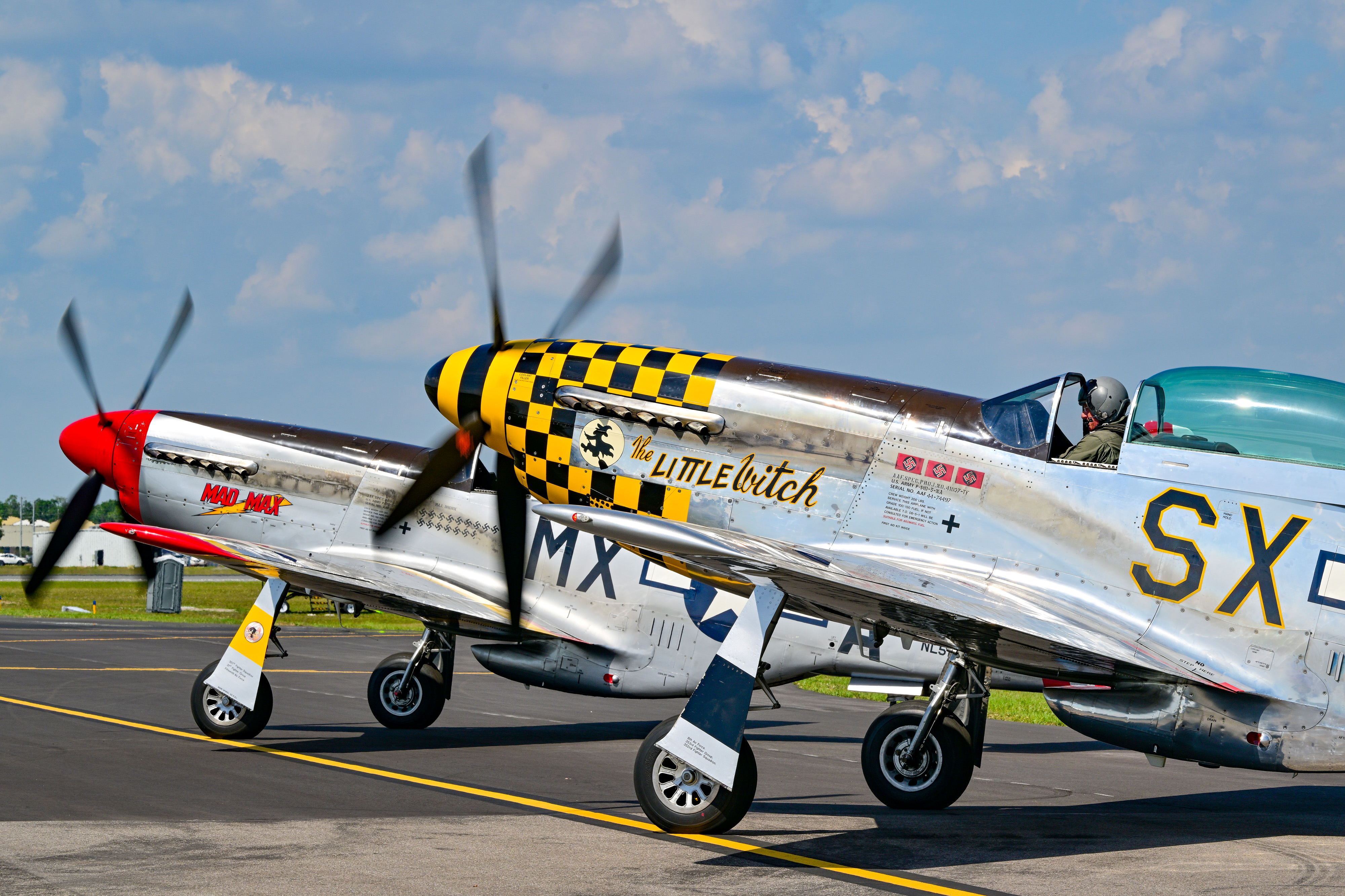 The High Flight Mustangs P-51 Demo Team start their engines.  Photo by David Tulis.