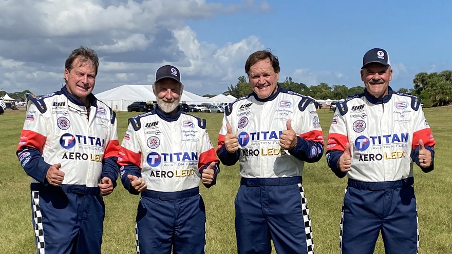 Members of the Titan Aerobatic Team pose in their new uniforms. From left to right: Mark Henley, Bryan Regan, Steve Gustafson, Jimmy Fordham. Photo courtesy of the Titan Aerobatic Team.