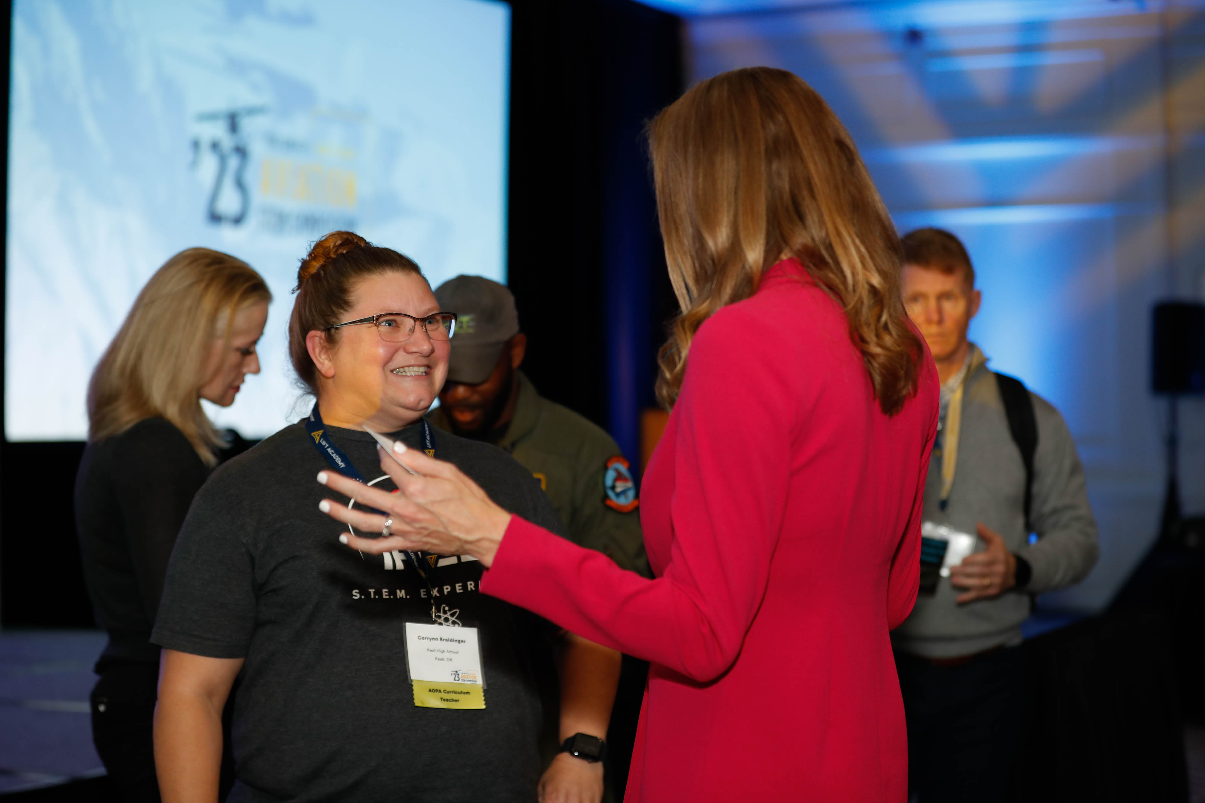 Jenny "Juno" Moore speaks with Corrynn Breidinger of Paoli High School in Paoli, Oklahoma, after her speech. Photo by Rebecca Boone.