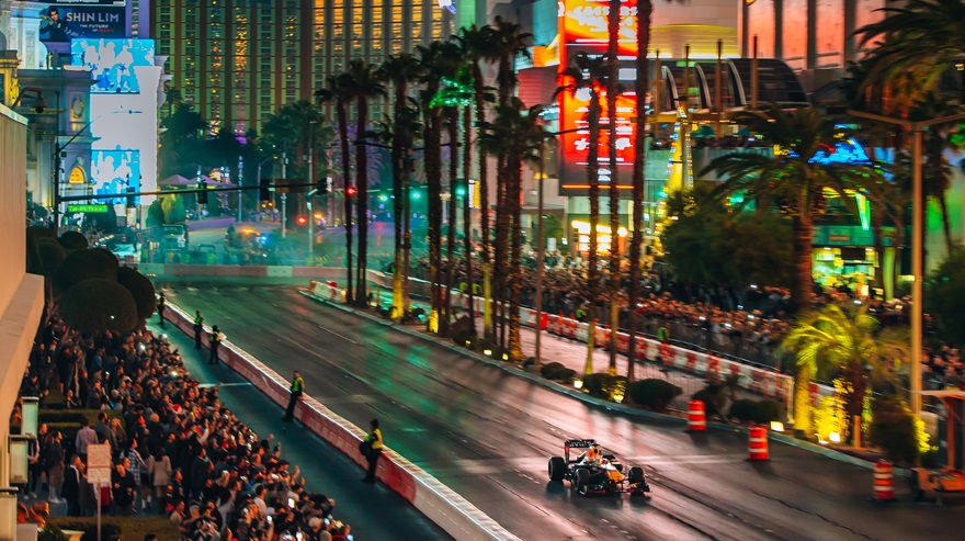 Red Bull F1 driver Sergio Perez takes a run past the crowd at the Las Vegas Grand Prix Launch Party in November 2022. Photo by Al Arena / Red Bull Content Pool.