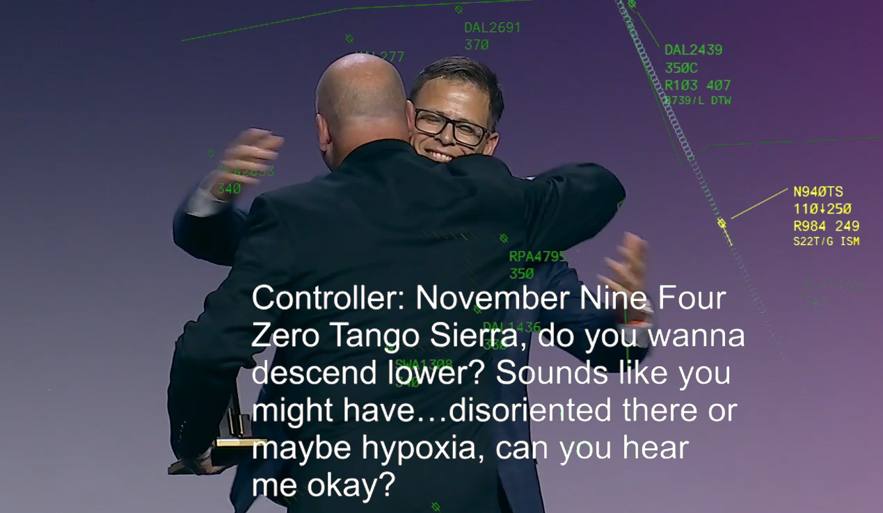 Pilot Chris Stradling hugs air traffic controller JJ Lytton during the 2023 Archie League Medal of Safety Awards presentation hosted by the National Air Traffic Controllers Association. Overlaid on this image, the radio transcription and radar track of Stradling's flight when he nearly lost consciousness due to hypoxia on January 9. Images courtesy of NATCA.