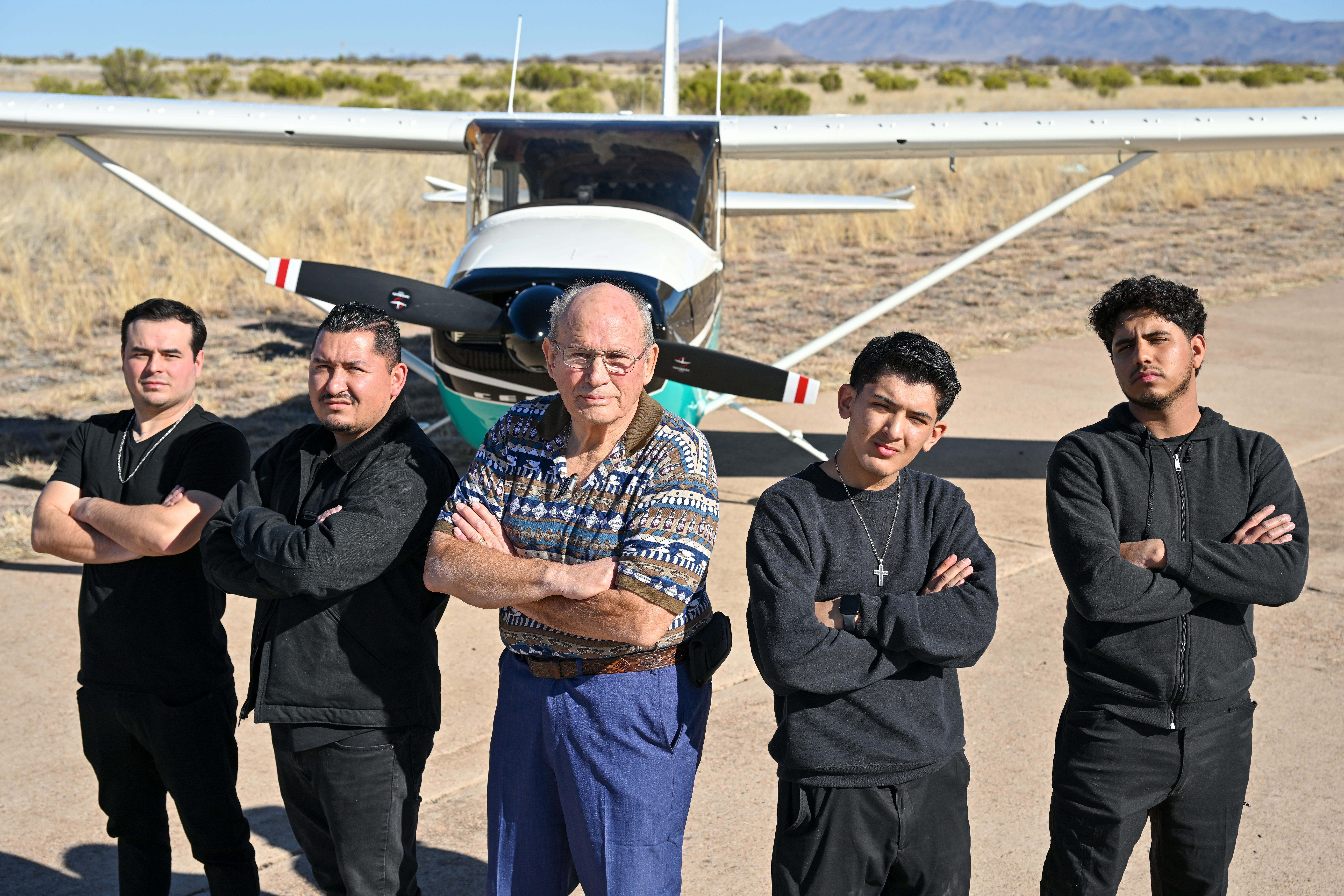 Gus Haussler of Master Aircraft Services Inc. (center) and his crew at Bisbee Douglas International Airport in Arizona. Photo by David Tulis.
