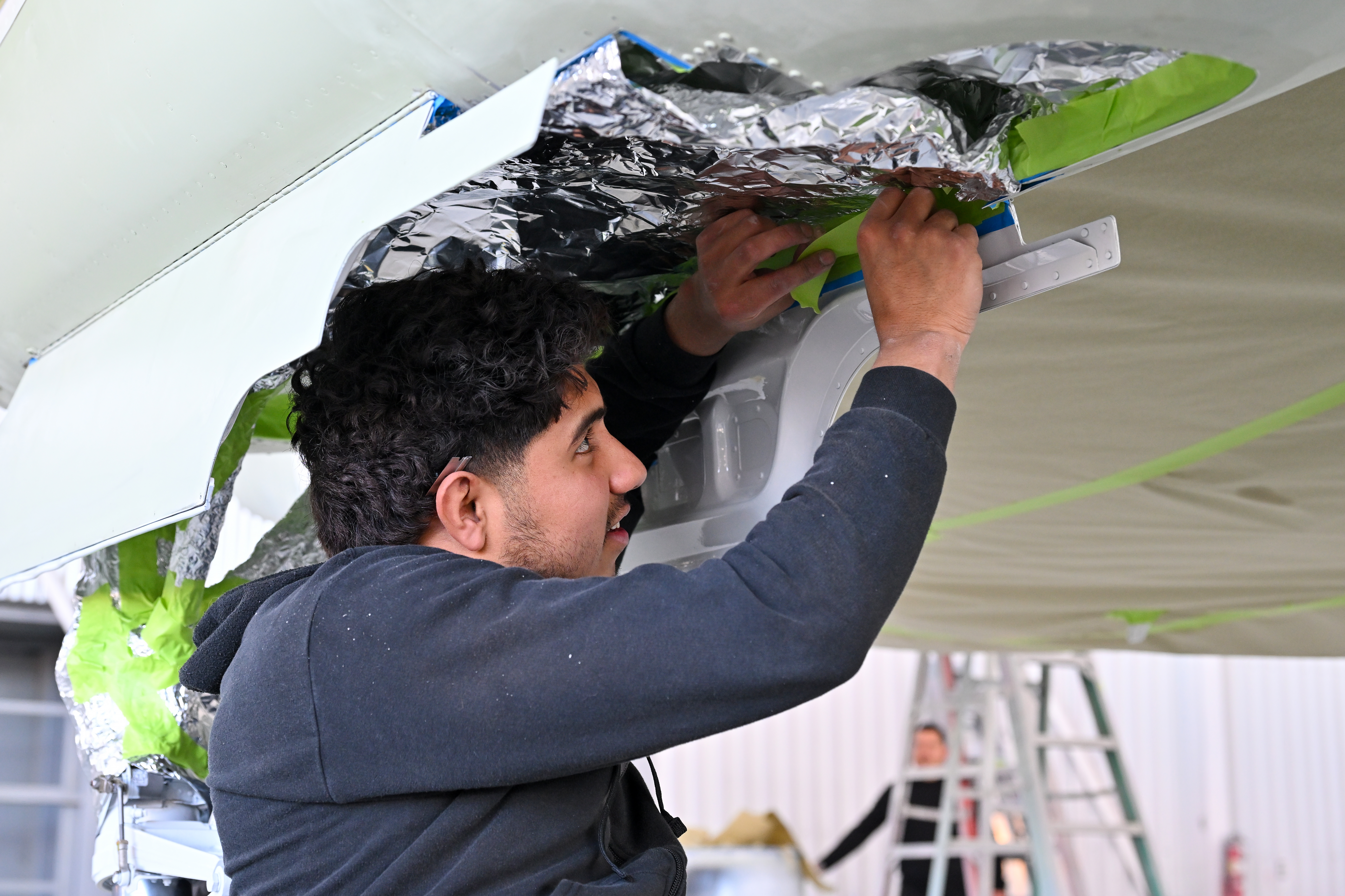 Workers at Master Aircraft Services Inc. repainted the AOPA Sweepstakes Cessna 182 at Bisbee Douglas International Airport in Arizona. Photo by David Tulis.