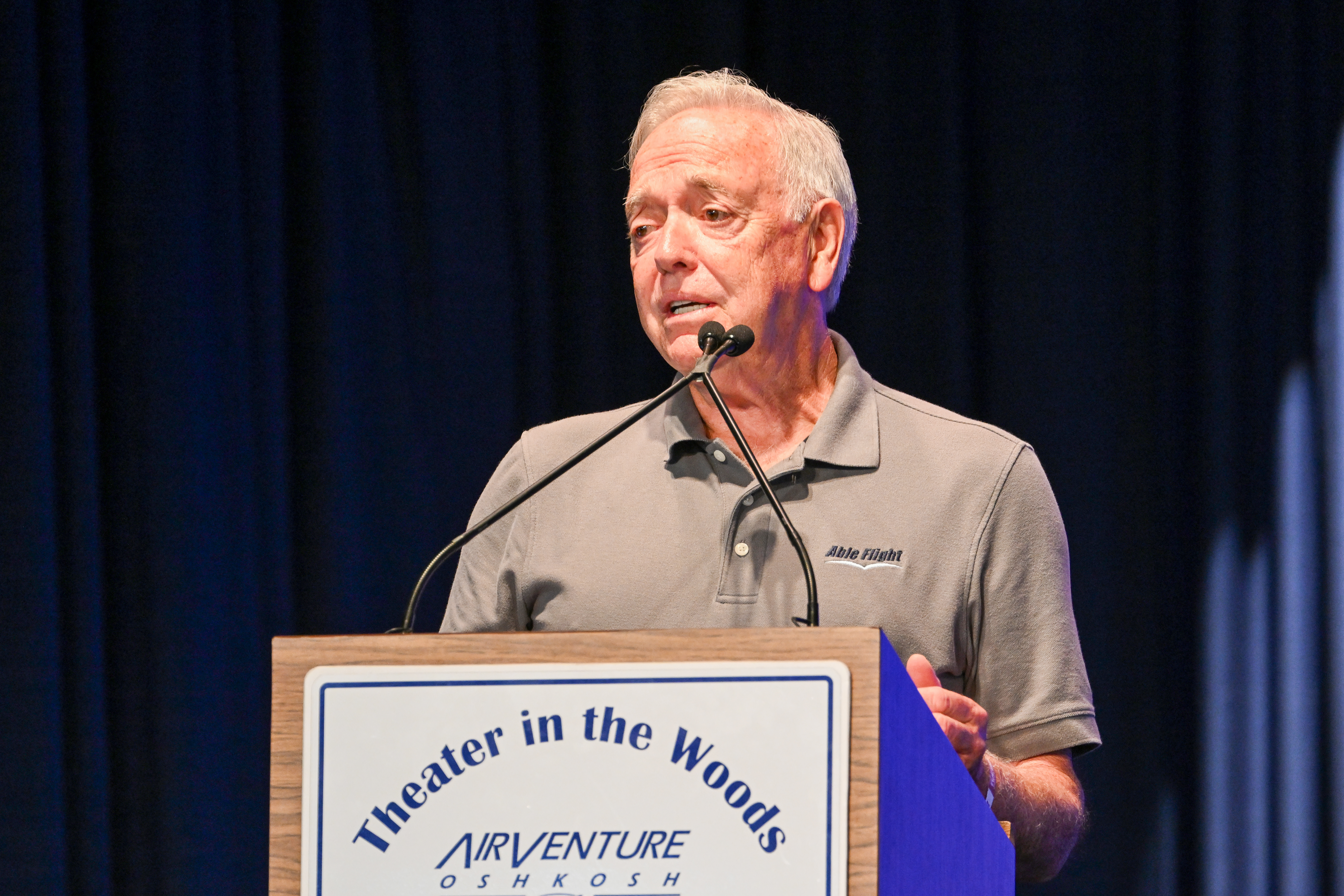 Able Flight Director Charles Stites announces awards. Photo by David Tulis.