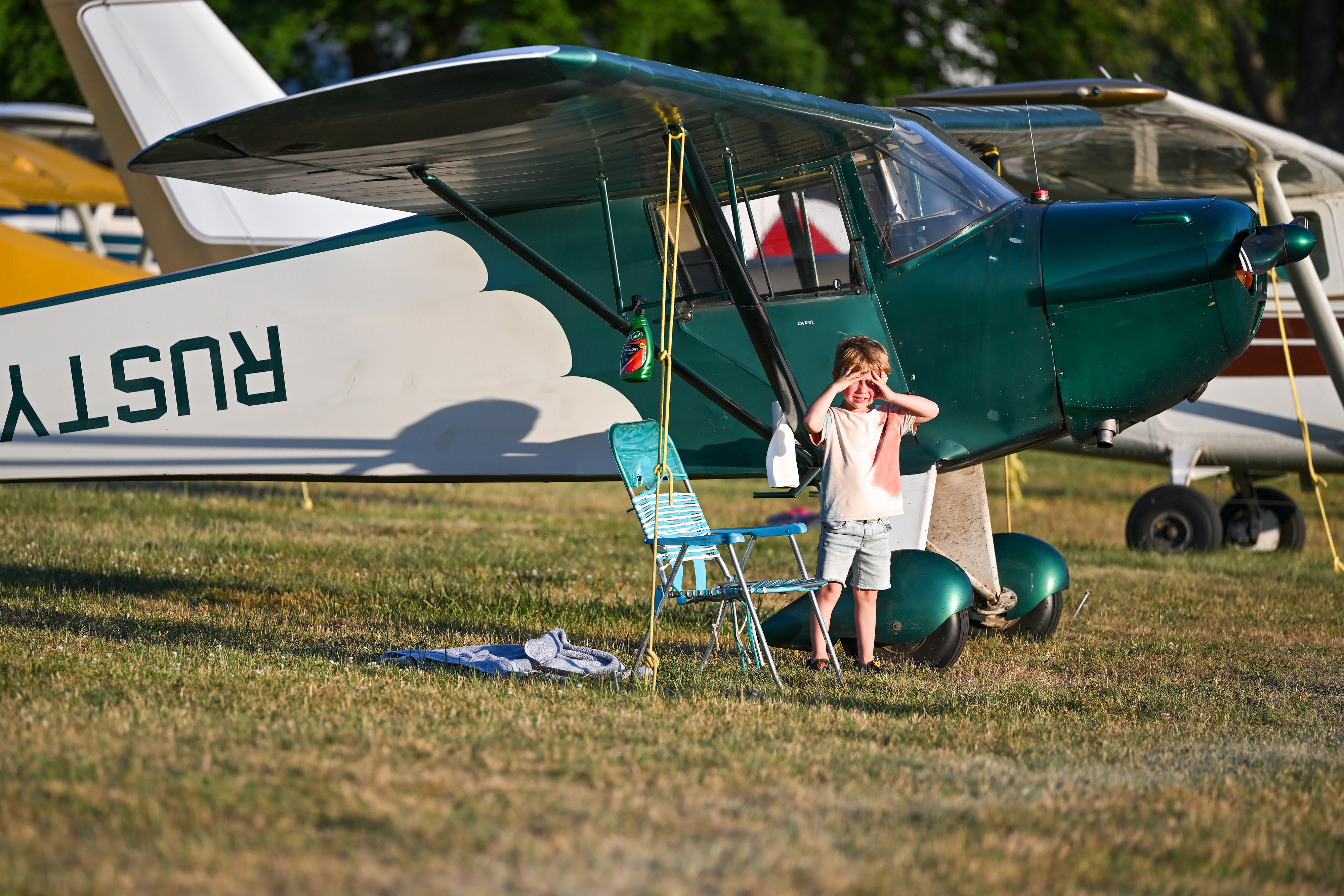 A youngster checks out the view from the flight line. Photo by David Tulis.