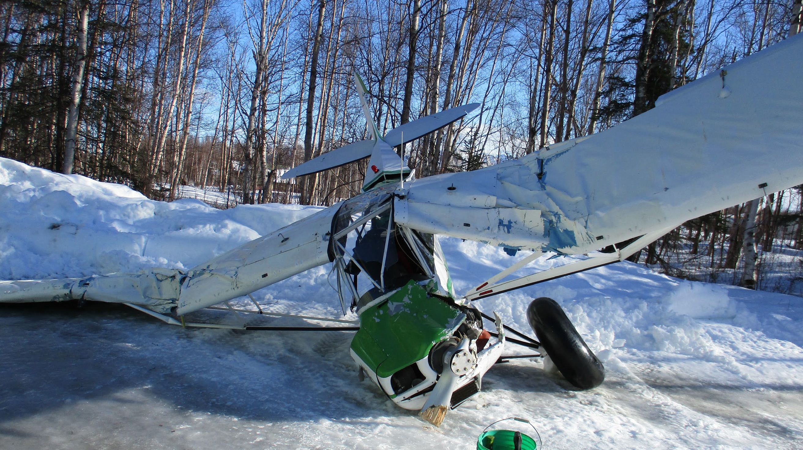 The Piper PA-18 Super Cub was damaged during an emergency landing attempt. NTSB photo.