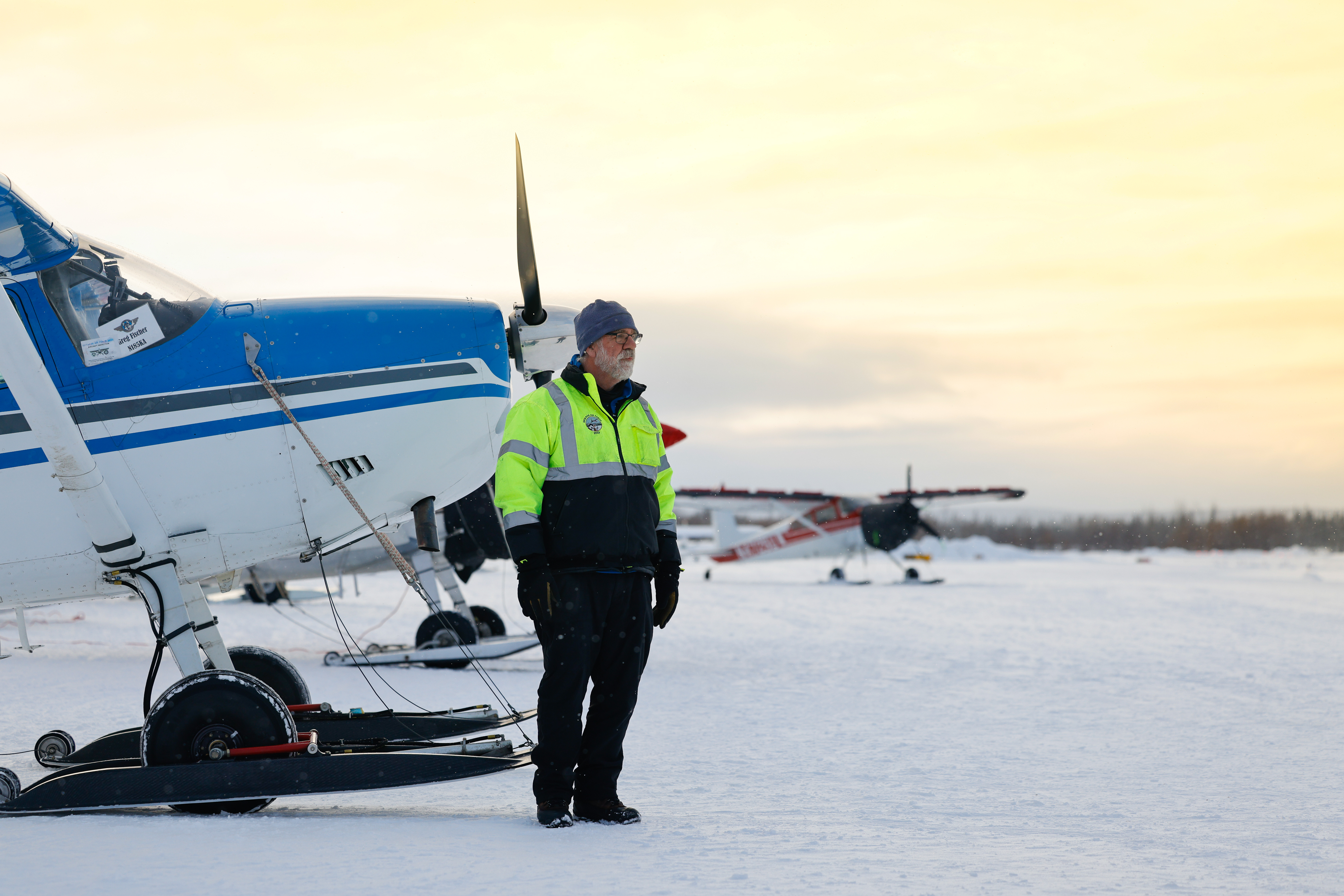 Greg Fischer has seen many of his flying days go to the dogs, and his daughter also volunteers with the Iditarod Air Force. Photo by Chris Rose.