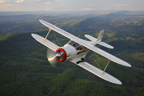 AOPA President Mark Baker will lead the parade of aircraft participating in the National Celebration of General Aviation D.C. Flyover over the National Mall in Washington, D.C., in his historic Beechcraft Staggerwing. Photo by Chris Rose.