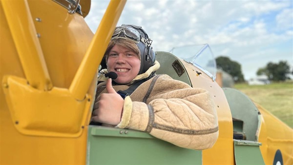 The author in the front seat of the de Havilland Tiger Moth. Photo by Madelyn Willis.