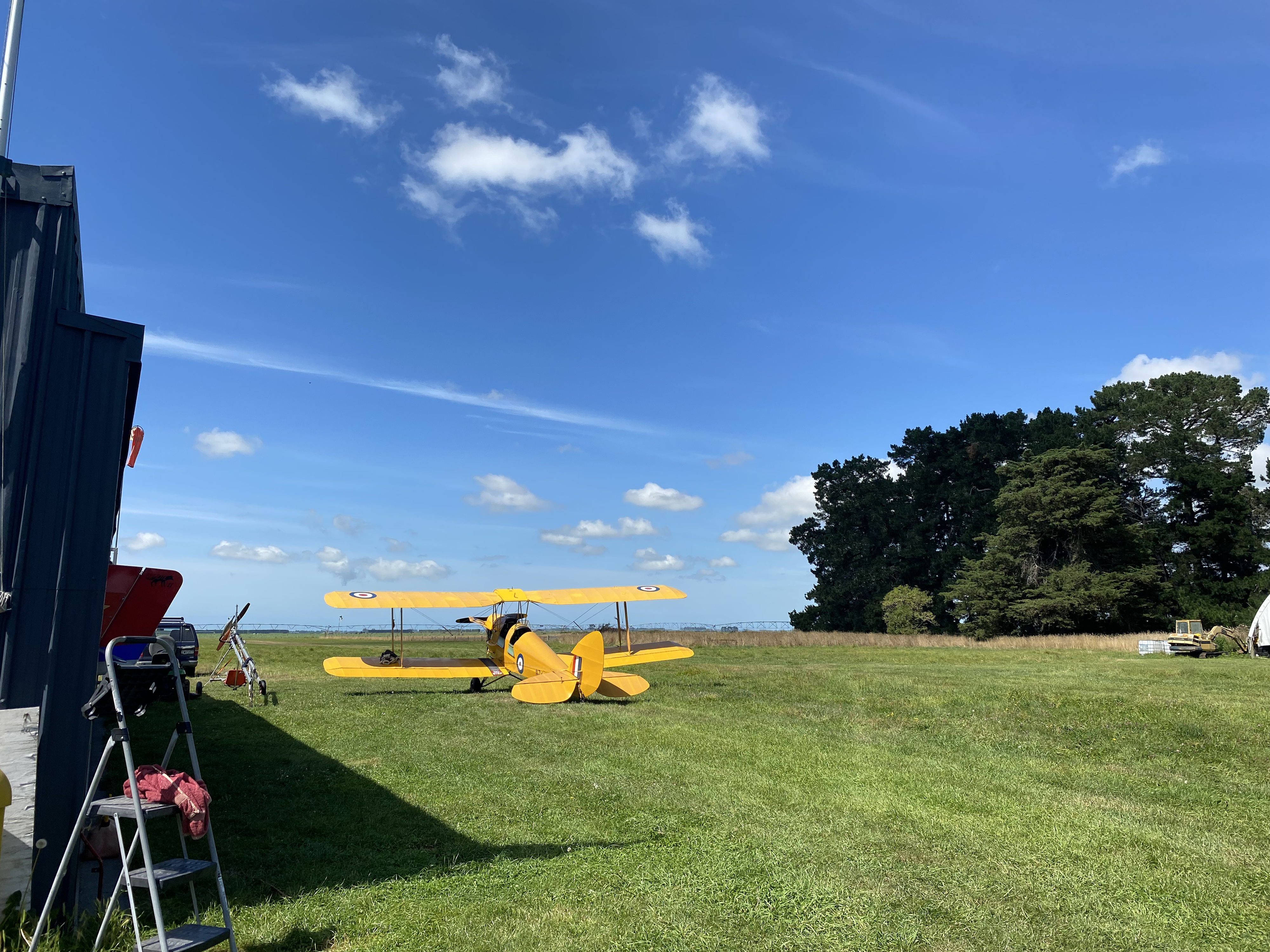Nothing like a yellow aircraft contrasting the blue sky. Photo by Patrick Barry.