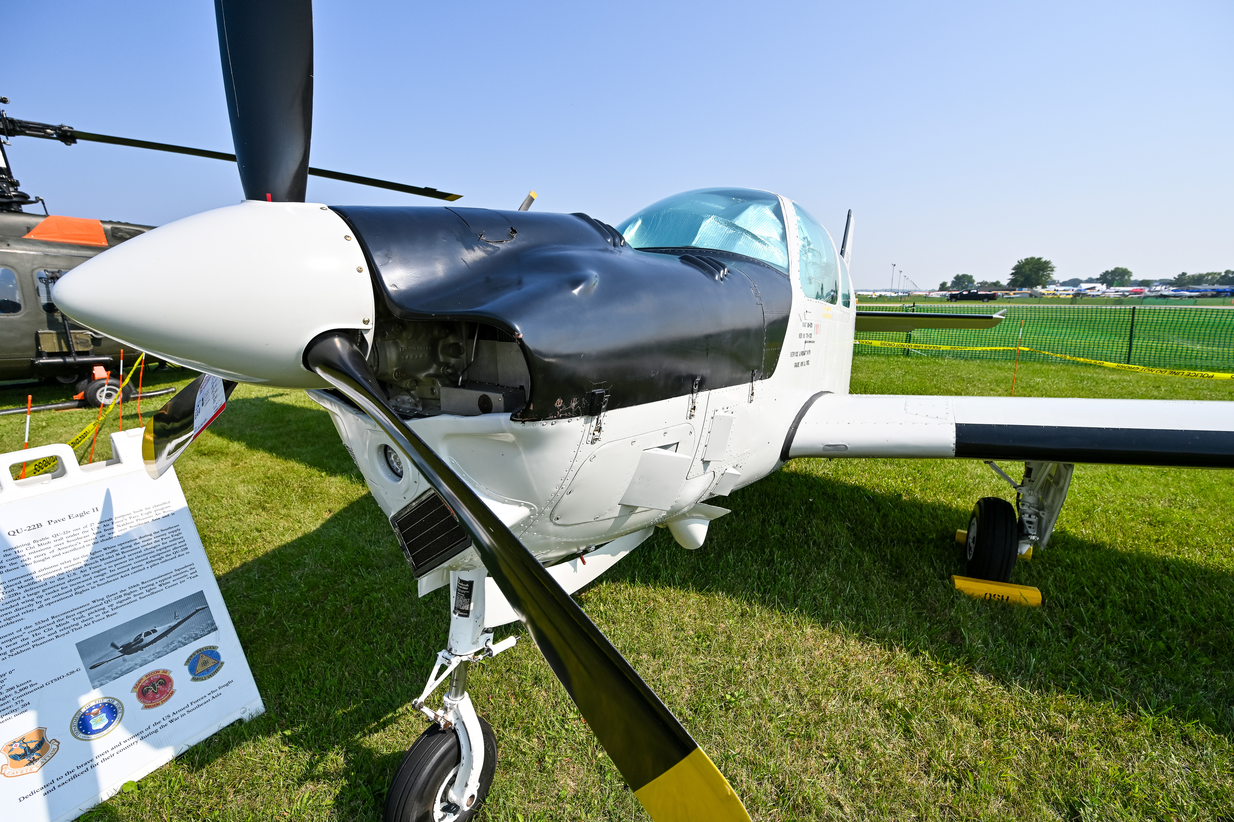 25_AirVenture_Sun1 Valaer's QU-22B teaches new generations about Operation Igloo White missions flown in this high-powered hodgepodge of Beechcraft airplanes during the Vietnam War. Photo by David Tulis.