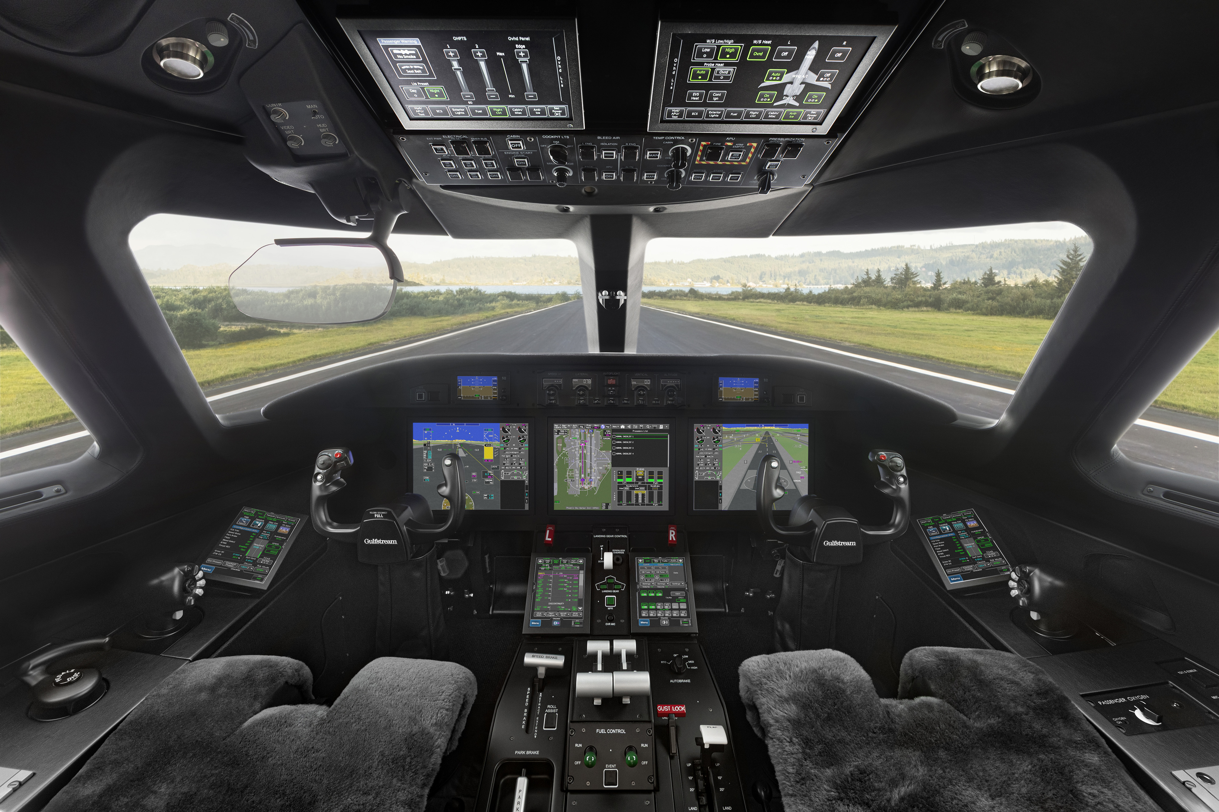 The G300's Harmony Flight Deck includes synthetic vision, head-up displays, Phase-of-Flight intelligence, and Gulfstream’s Predictive Landing Performance System, with six touch screens that are expected to deliver a similar pilot experience for those transitioning from the large-cabin Gulfstreams. Photo courtesy of Gulfstream Aerospace Corp.