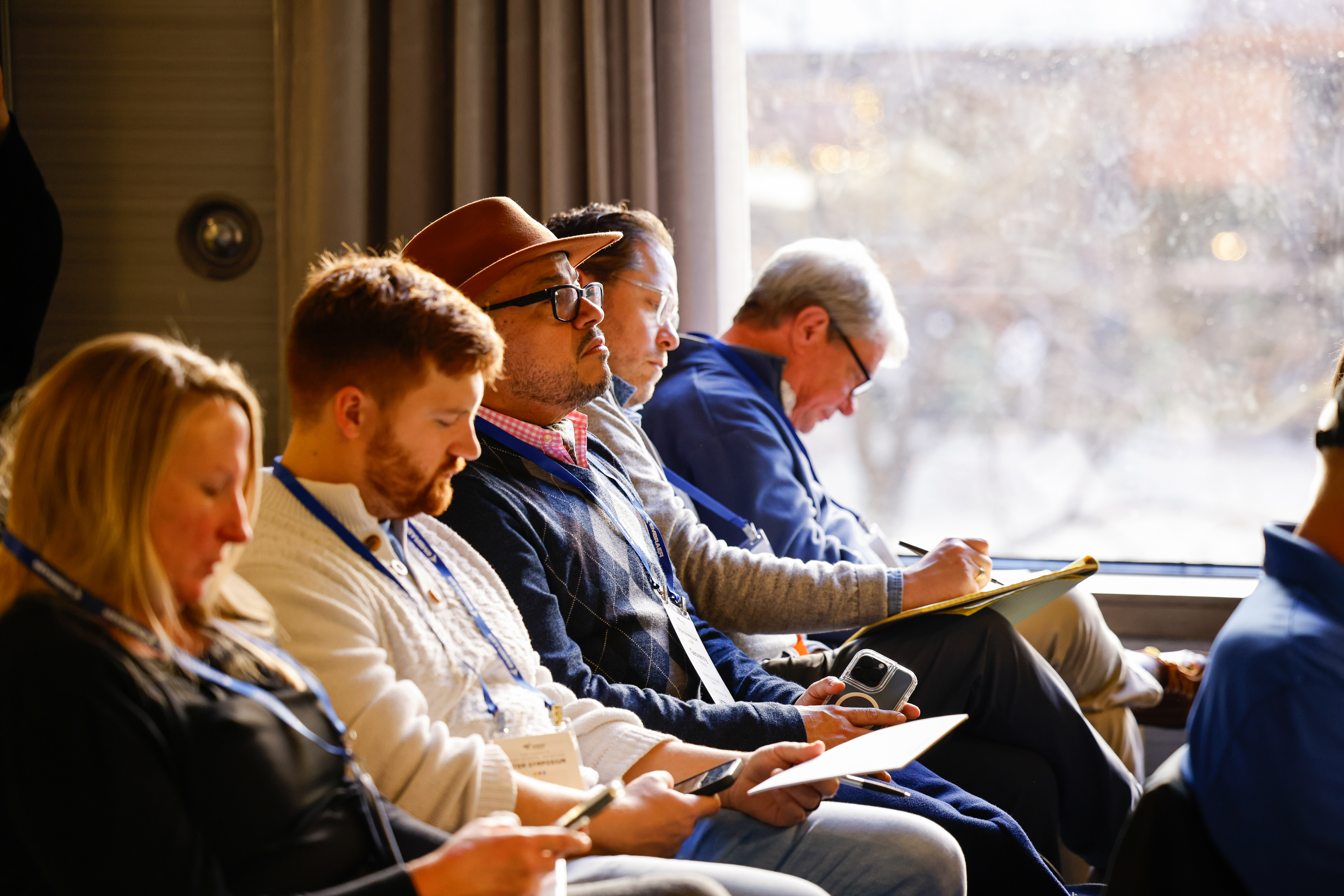 Attendees listen and take notes. Photo by Chris Rose.