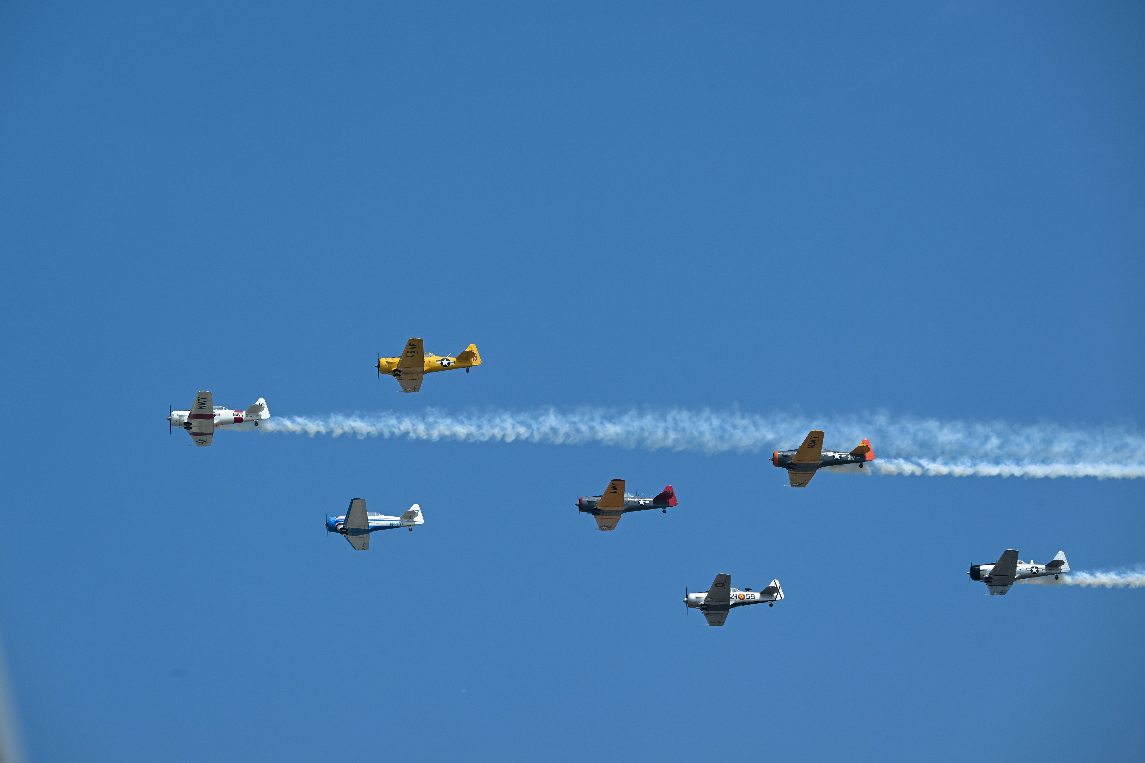 Warbirds of America pilots participate in the opening day airshow on July 20. Photo by David Tulis.