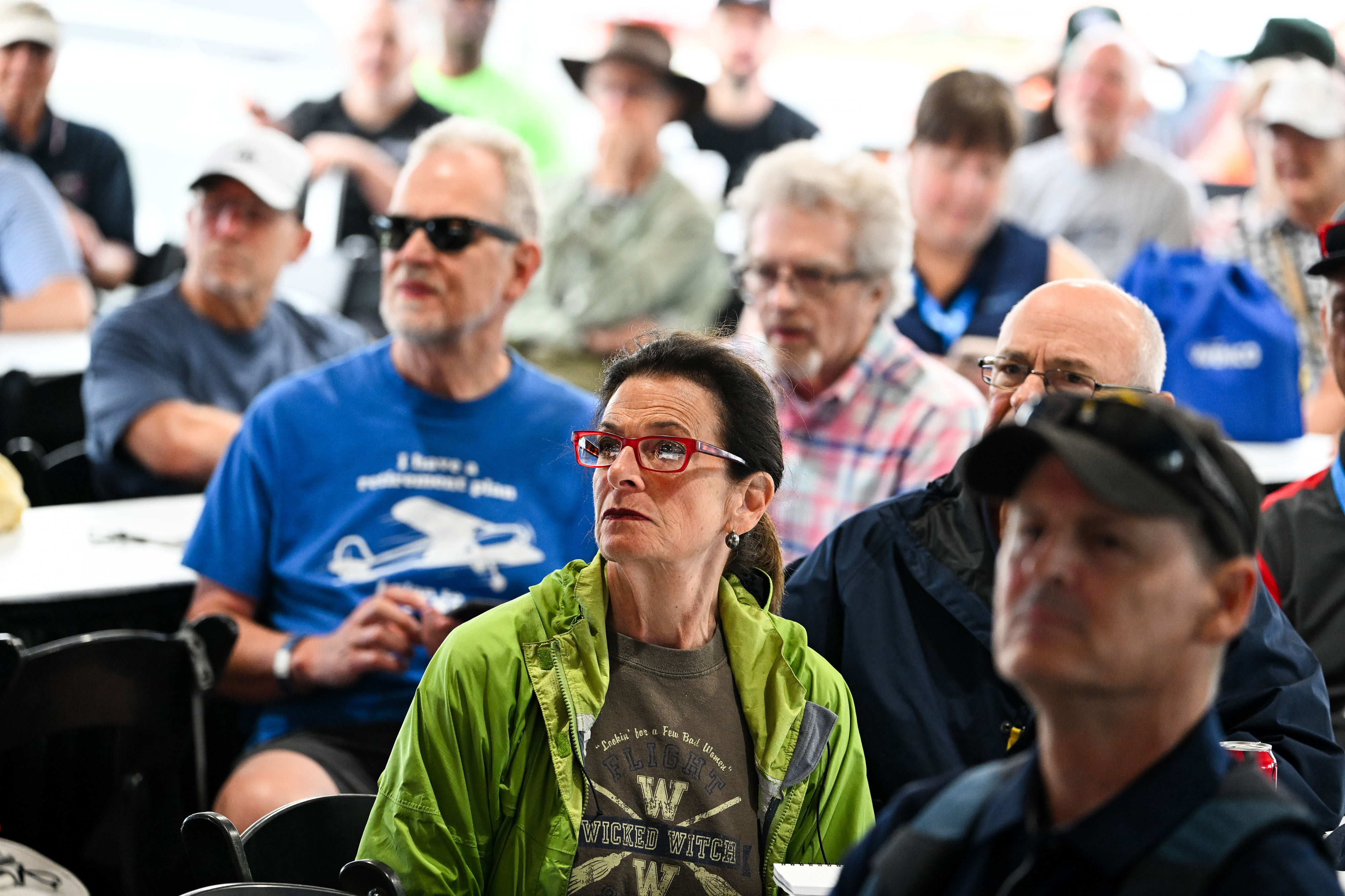 Attendees of 'The Schiff Show' listen to presenter Brian Schiff. Photo by David Tulis.
