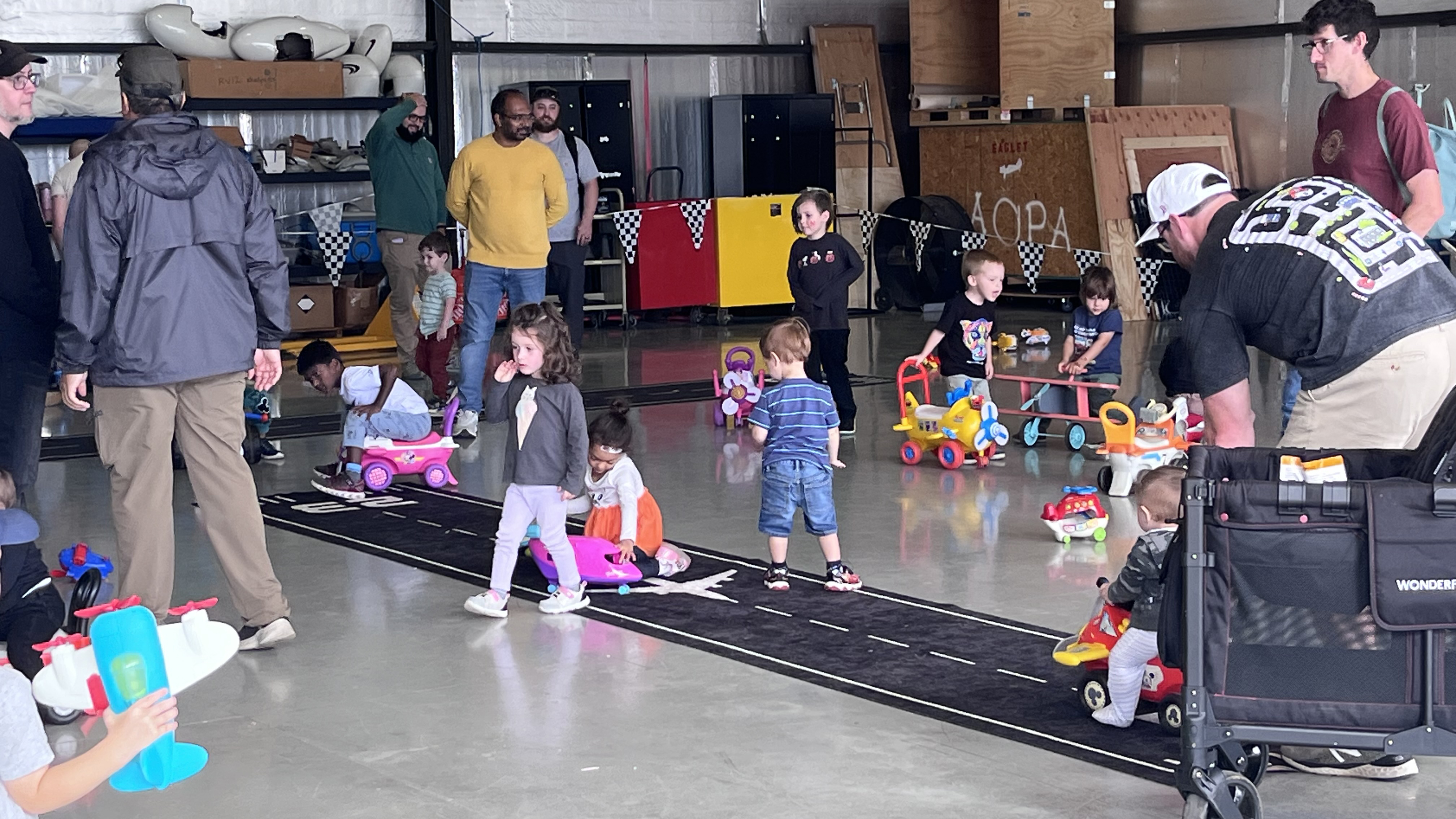 Younger kids had a ball taking off from the runway in another hangar. Photo by Sylvia Horne.