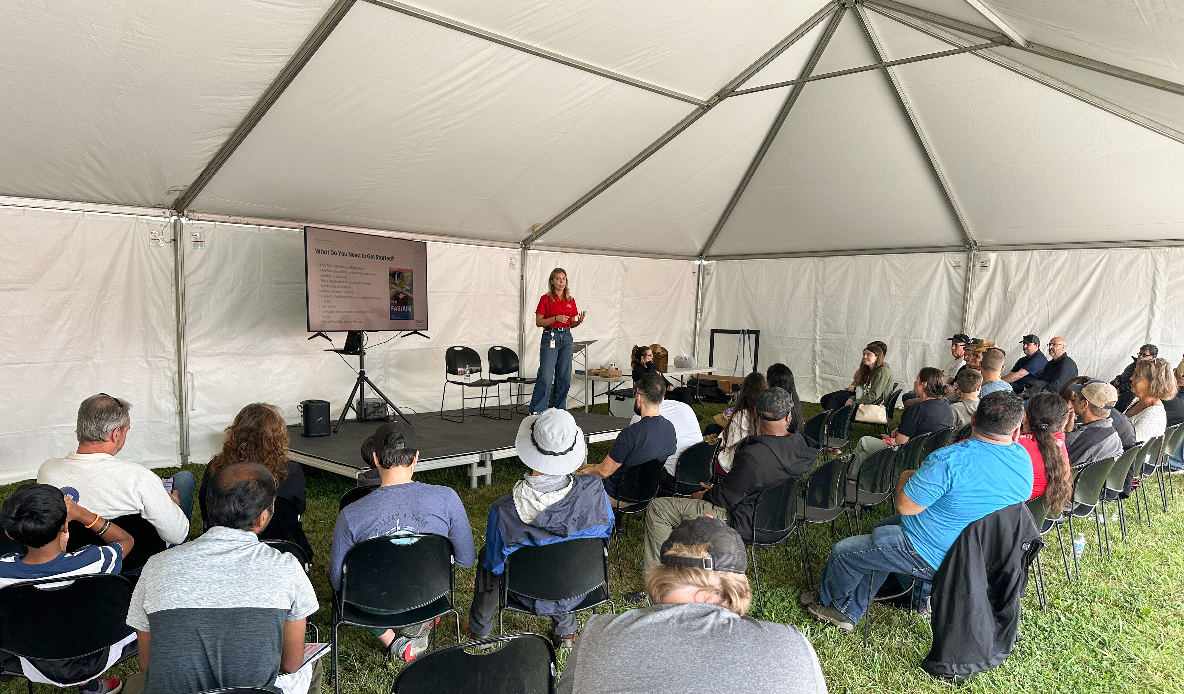 AOPA Aviation Events Senior Specialist Addison Lomax gives a presentation. Photo by David Tulis.