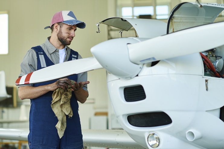 A mechanic repairs a small aircraft. iStock photo.    