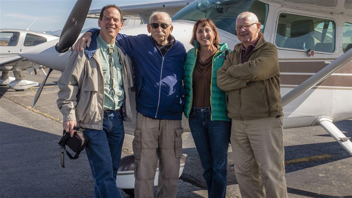 Bruce Papier and Uli Niemeyer greet the author and his wife, Jean, at the Santa Fe Municipal Airport.