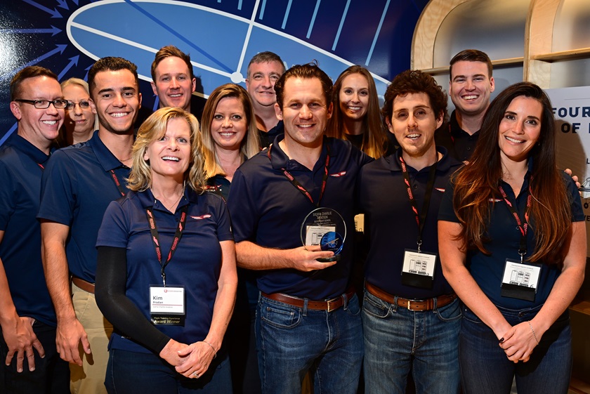 Flight school professionals from Sierra Charlie Aviation receive recognition as the best flight school in the Western Pacific region during the 2019 AOPA Flight Training Experience Awards presentation in Denver. The school was recognized in the same category in the 2021 awards. Photo by David Tulis.
