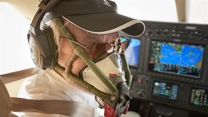 An oral-nasal rebreather mask may be used up to 25,000 feet. It has a better fit than a cannula and increases the percentage of oxygen the wearer inhales.